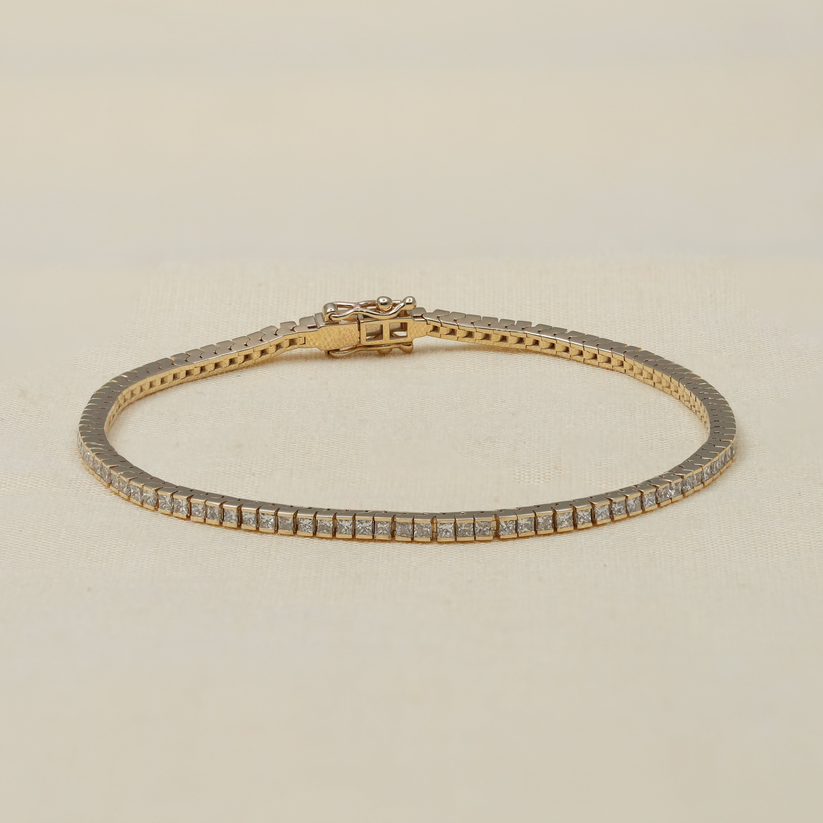 Bar setting princess lab grown diamond tennis bracelet in yellow gold