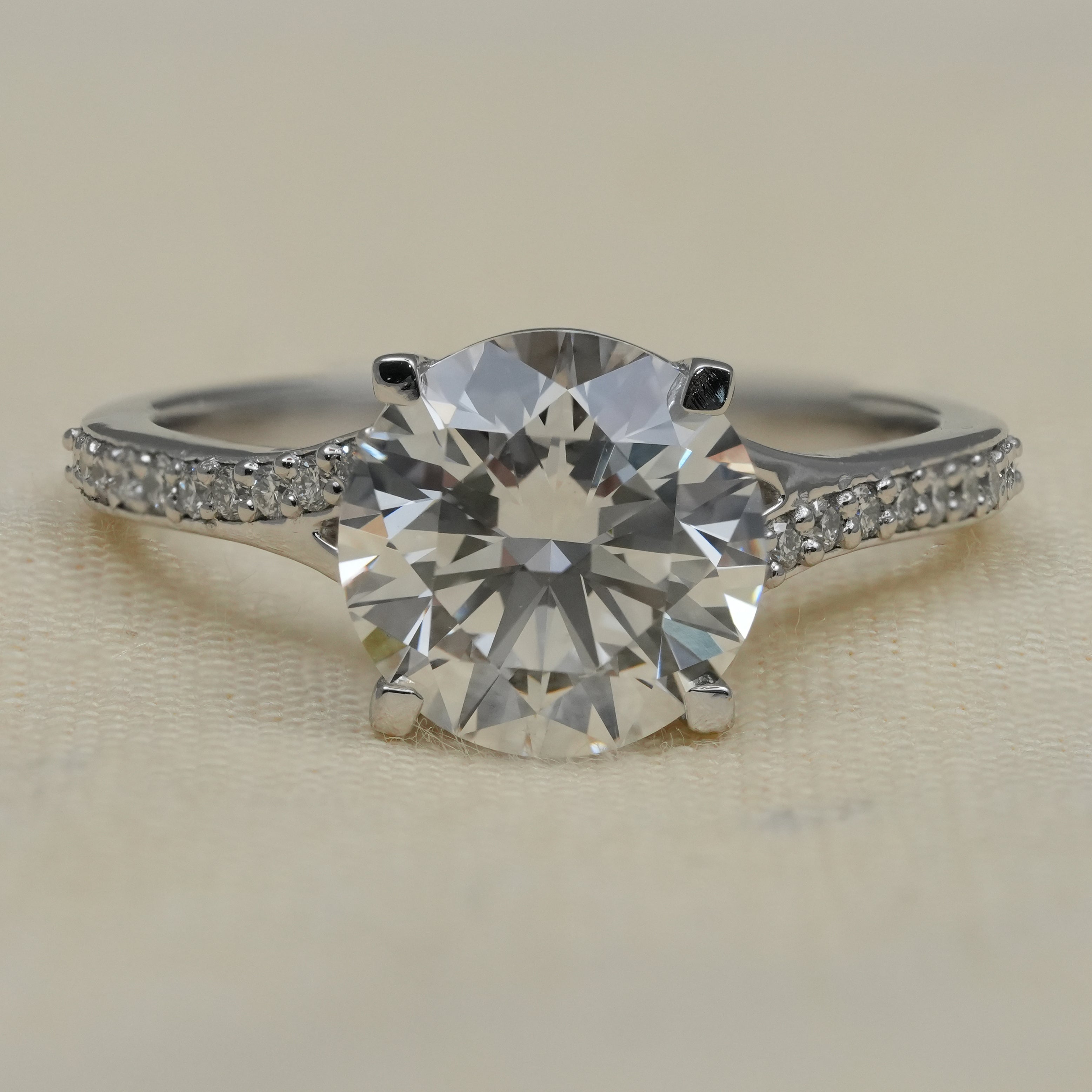 Round lab grown diamond engagement ring pavé band white gold