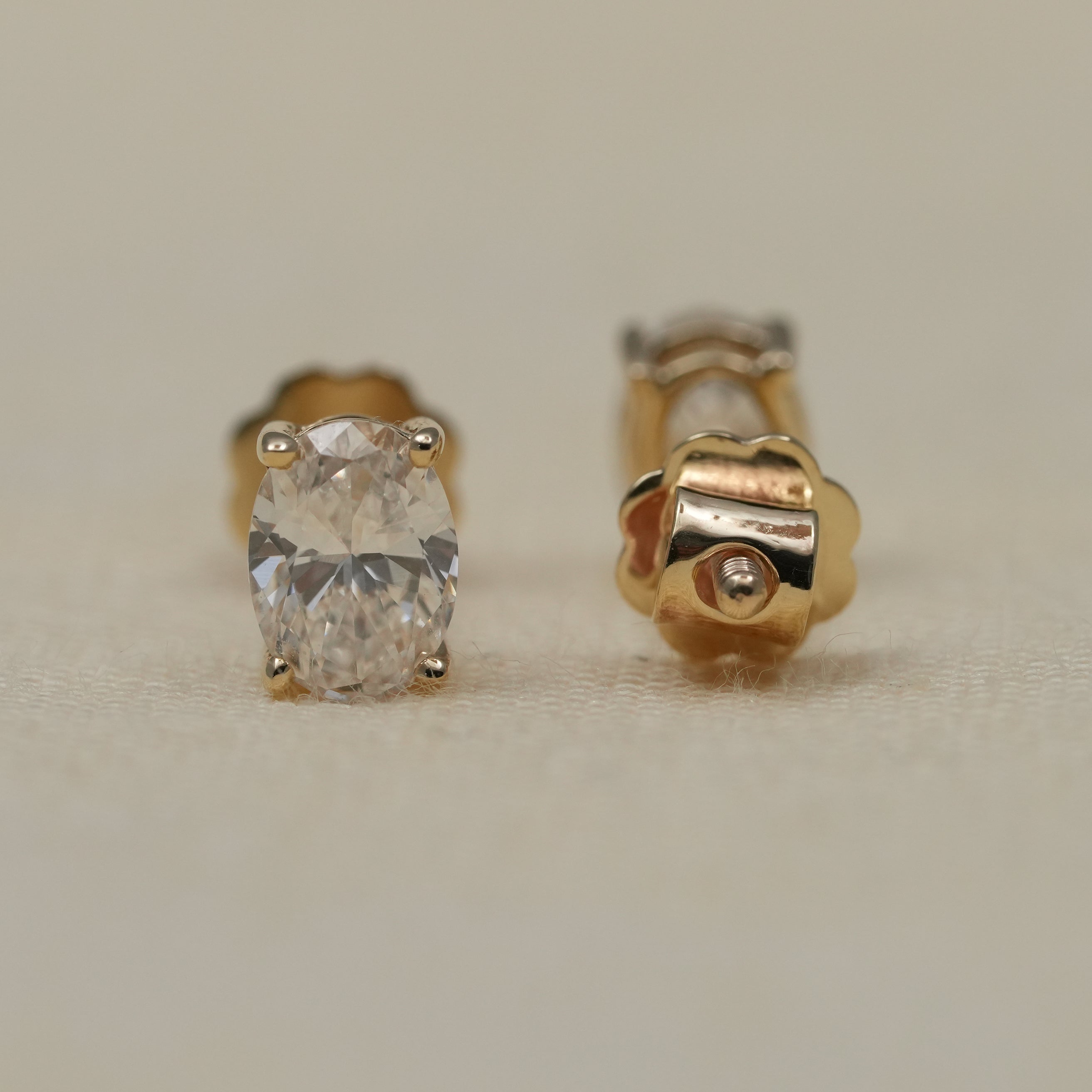 Luxury oval lab grown diamond stud earrings showcasing brilliant sparkle and symmetry