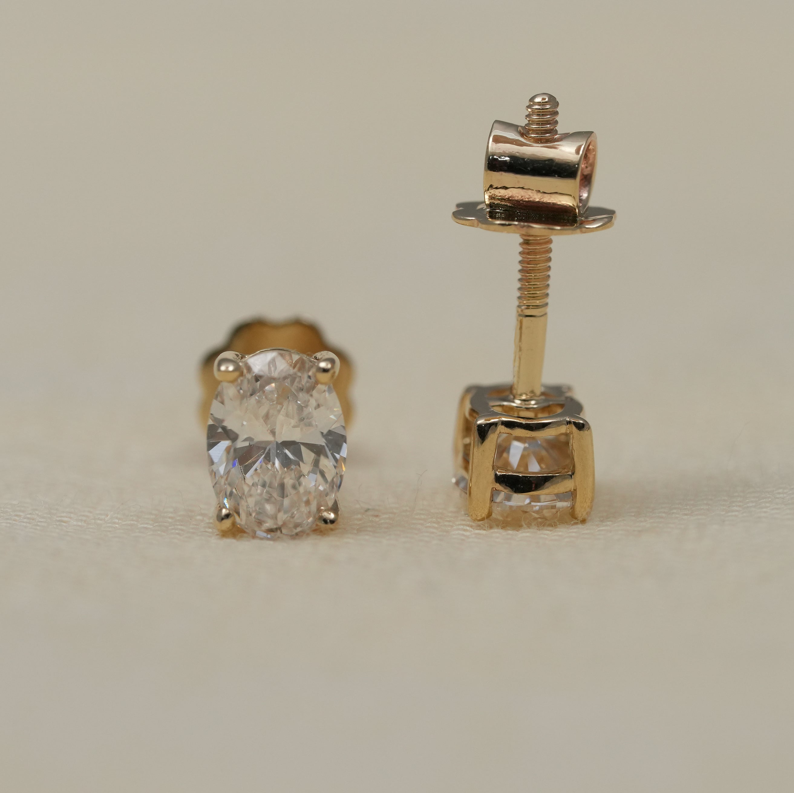 Elegant oval lab-grown diamond solitaire earrings with timeless fine jewelry appeal