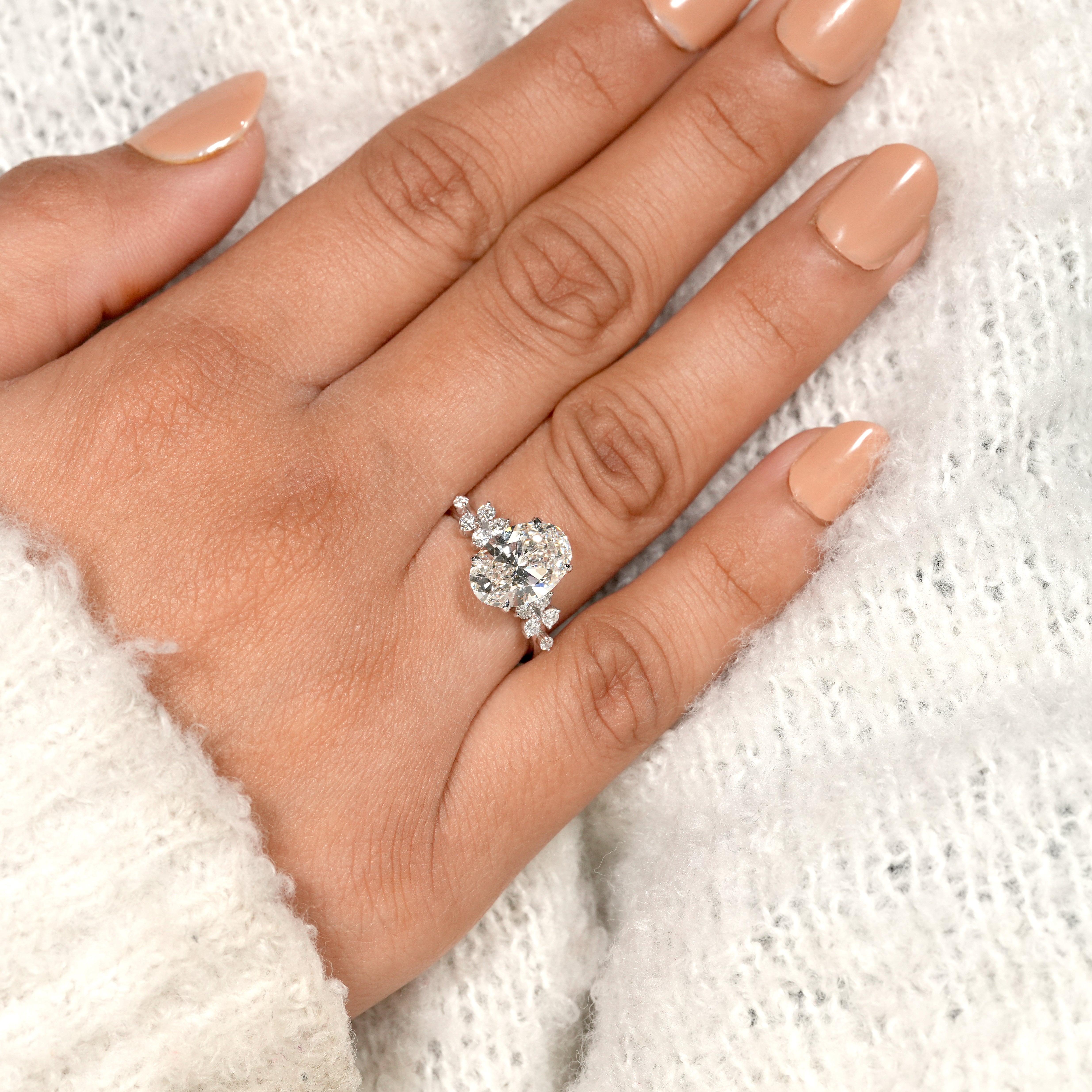 Oval Solitaire Lab Diamond Ring with Floral Diamond Side Details