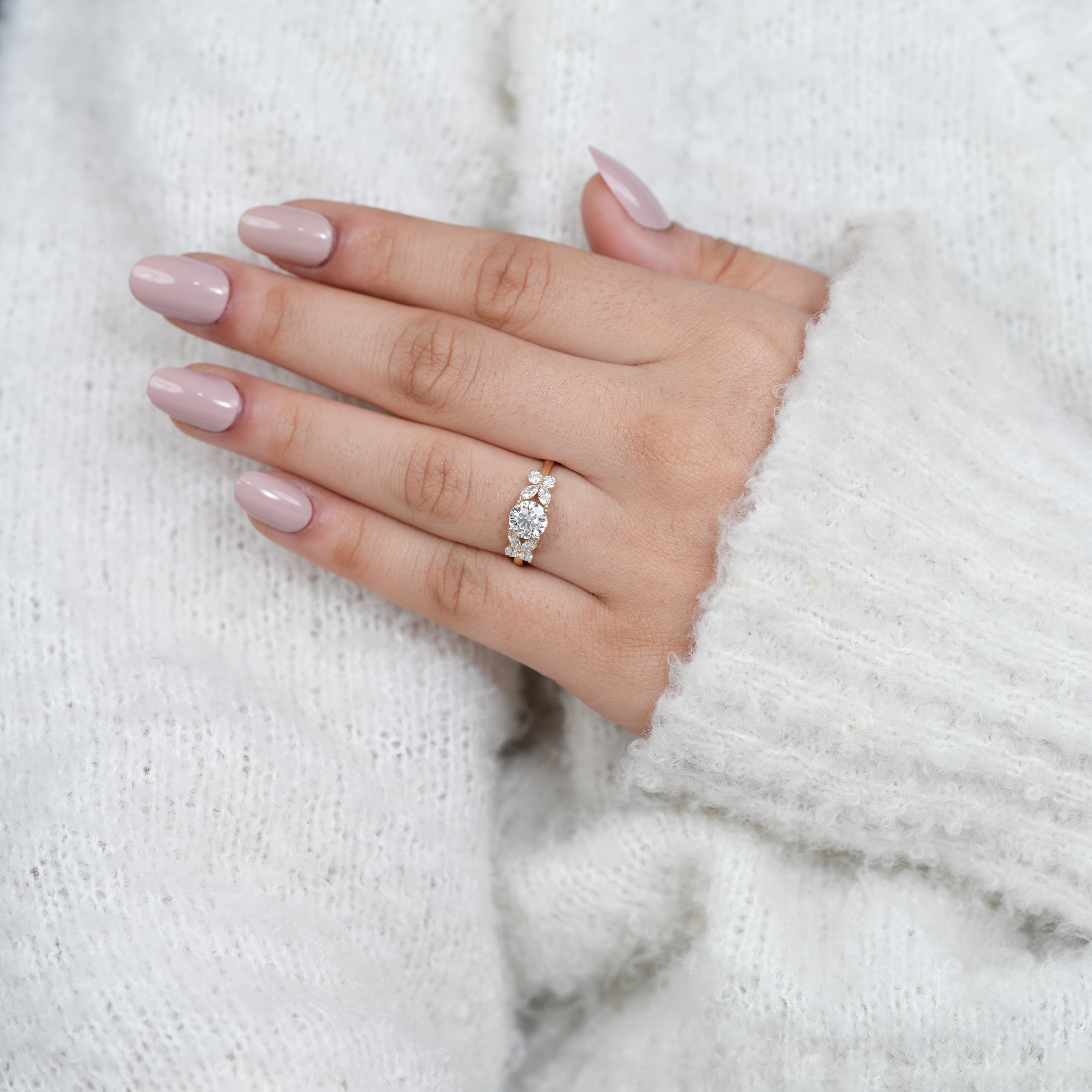 Romantic round lab grown diamond engagement ring with floral sides