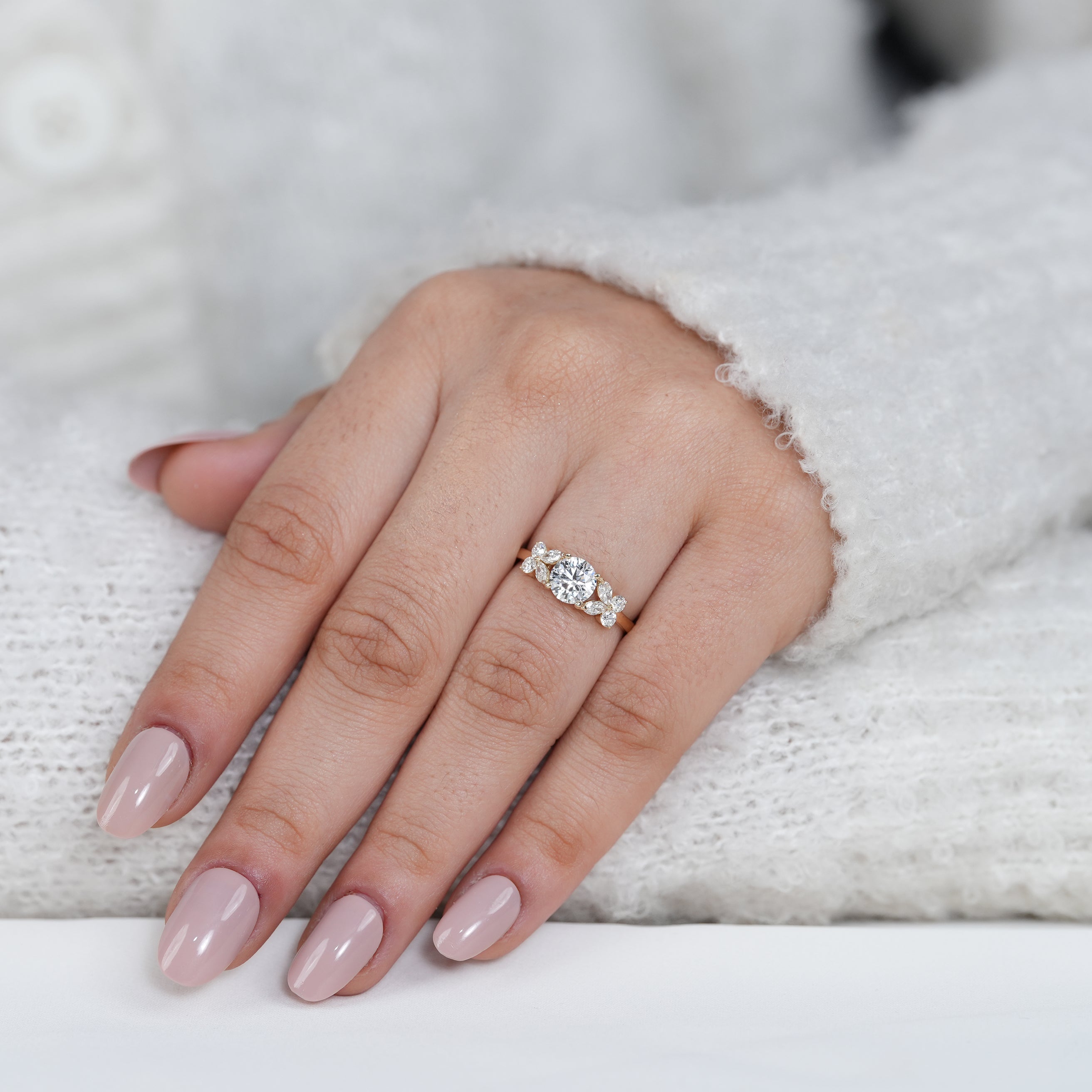 Designer round lab grown diamond ring with decorative side clusters