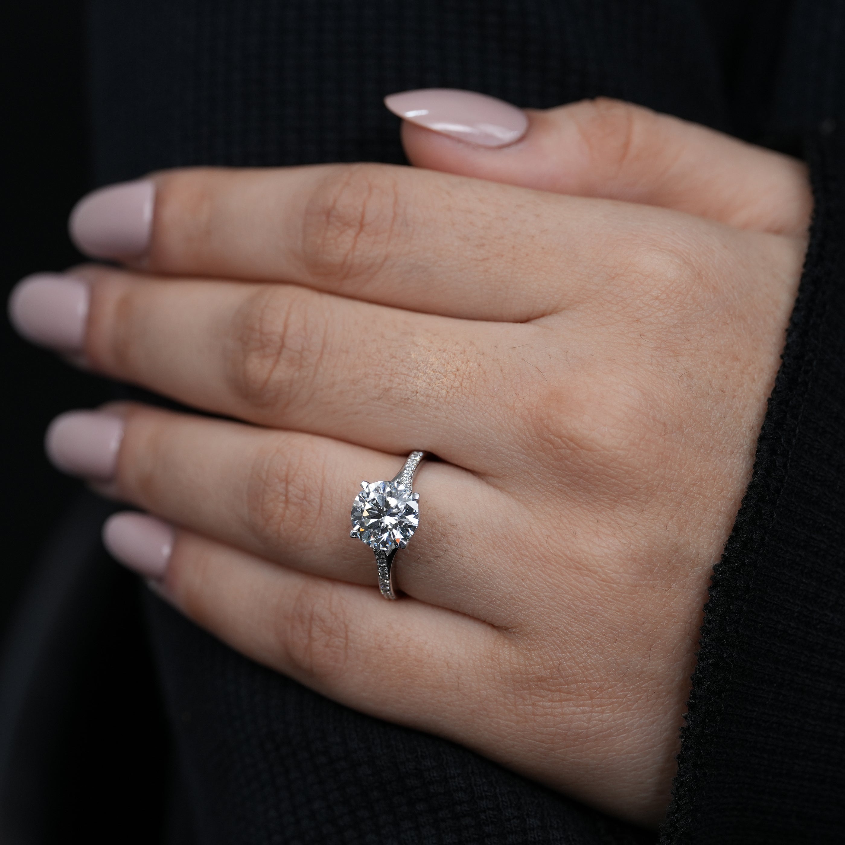 Elegant round lab grown diamond proposal ring delicate pavé band
