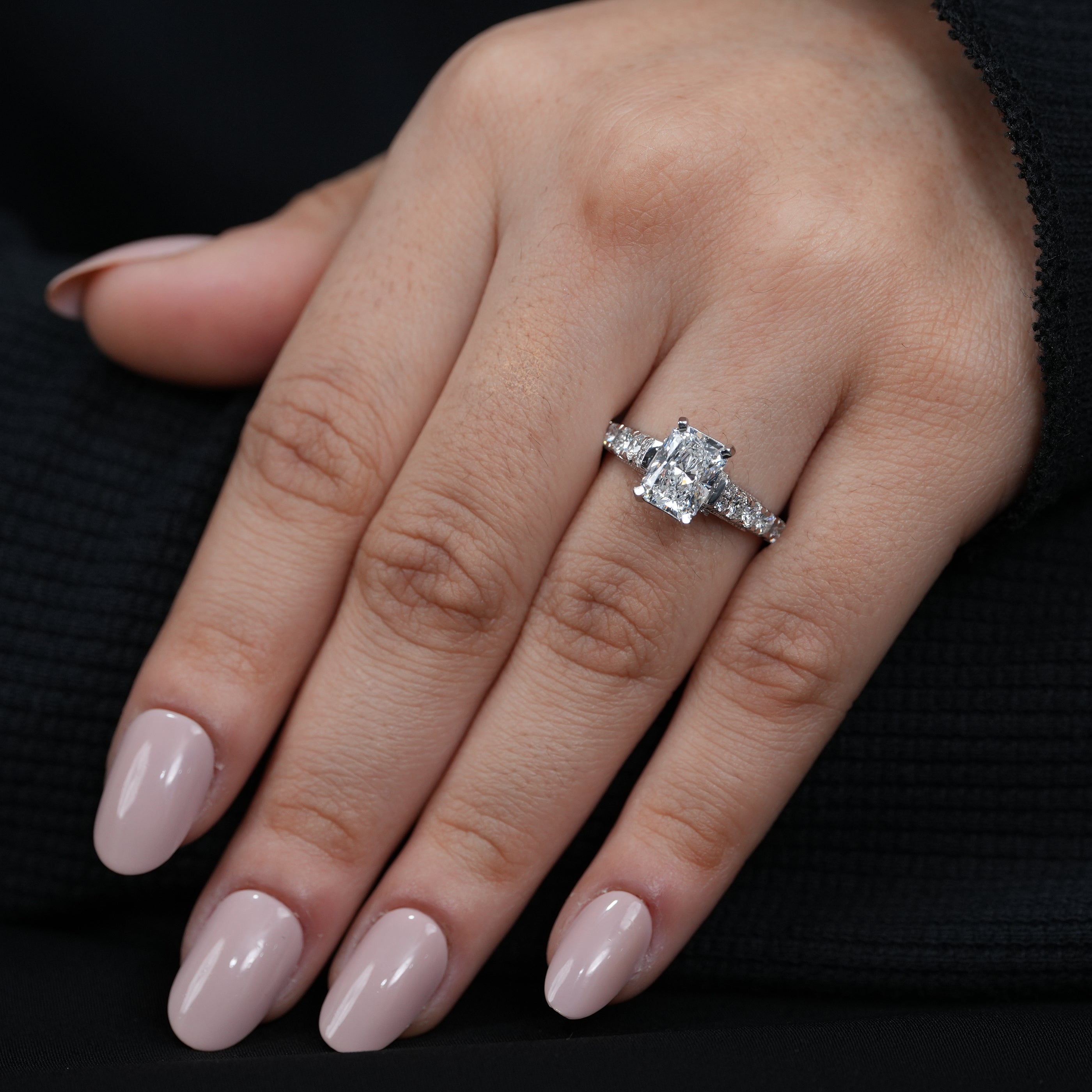 Timeless radiant lab grown diamond engagement ring with vintage tapered shoulders.