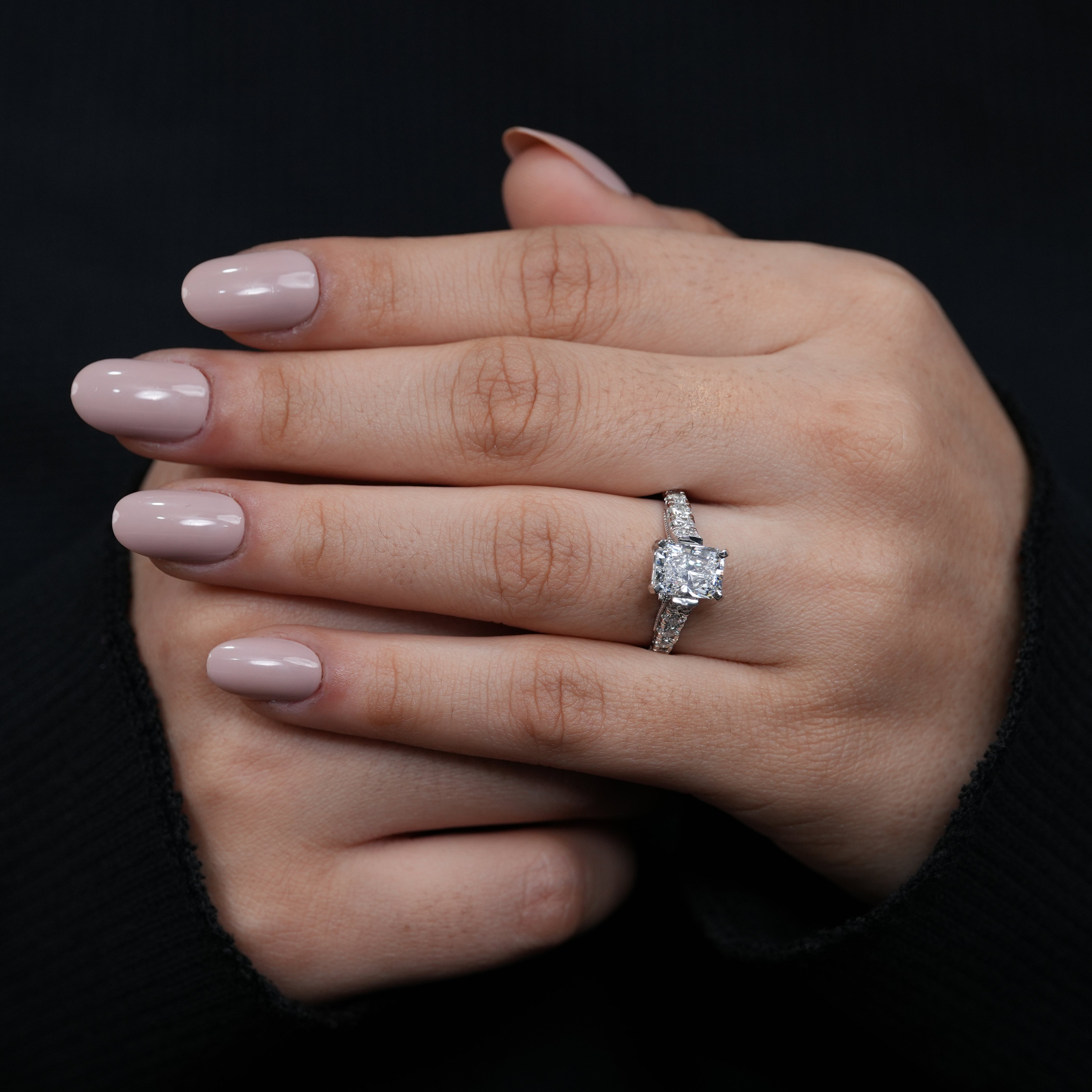 Sophisticated radiant lab grown diamond engagement ring elegant white gold side stones.