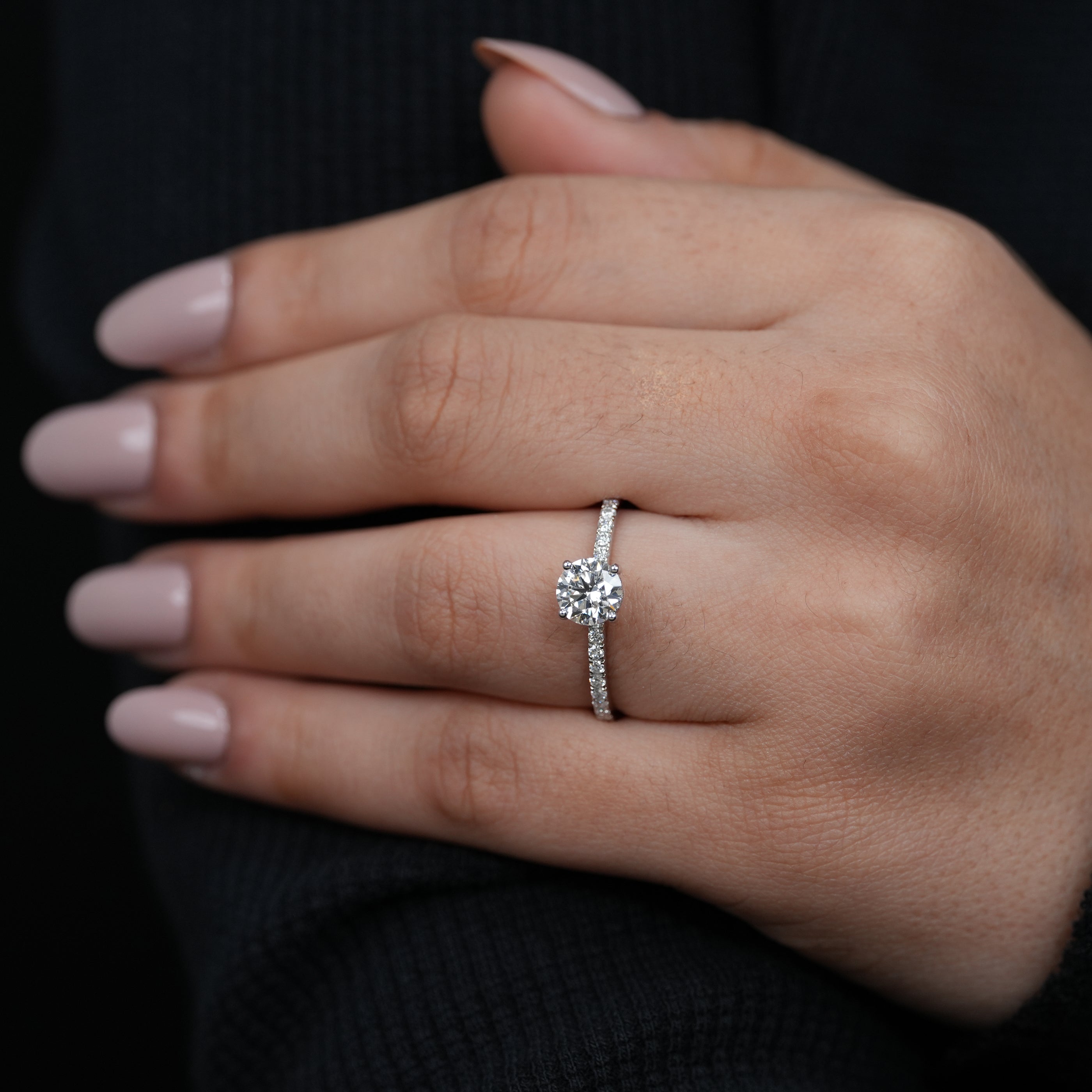 Elegant round lab grown diamond solitaire ring delicate pavé setting