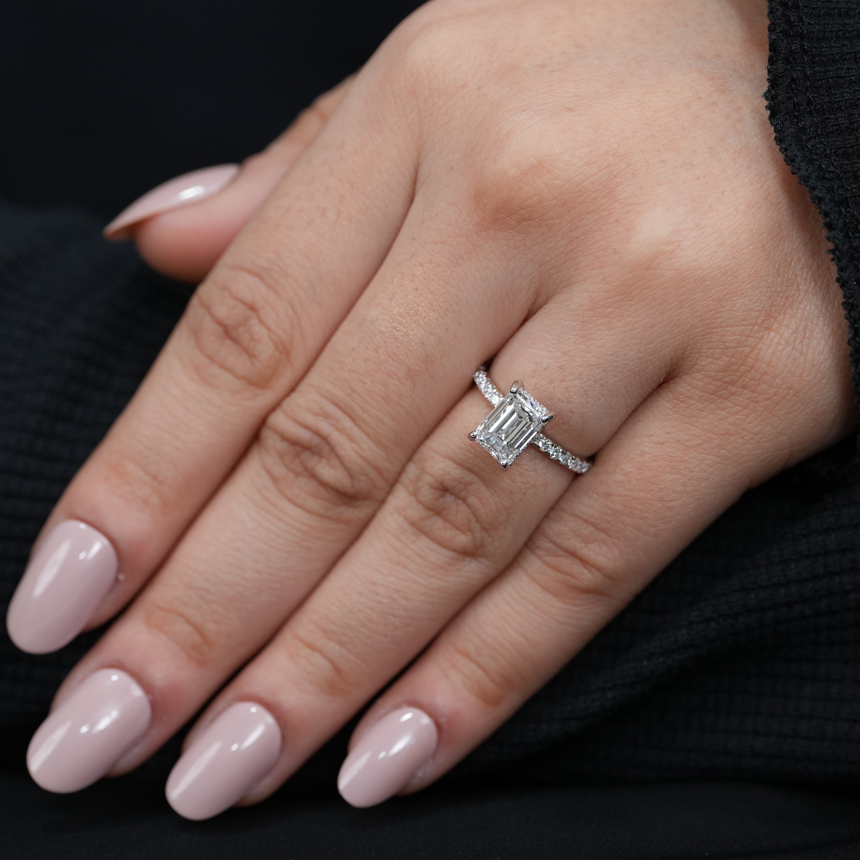 Designer emerald cut lab grown diamond ring sleek white gold band