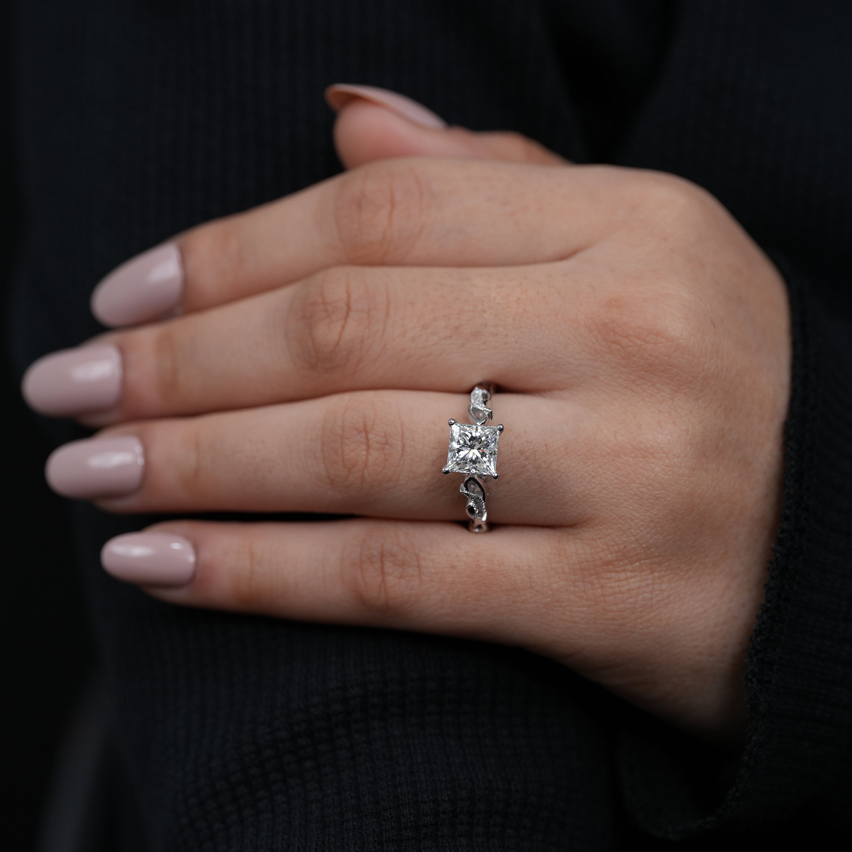 Modern square lab grown diamond engagement ring delicate pavé twisted shoulders.