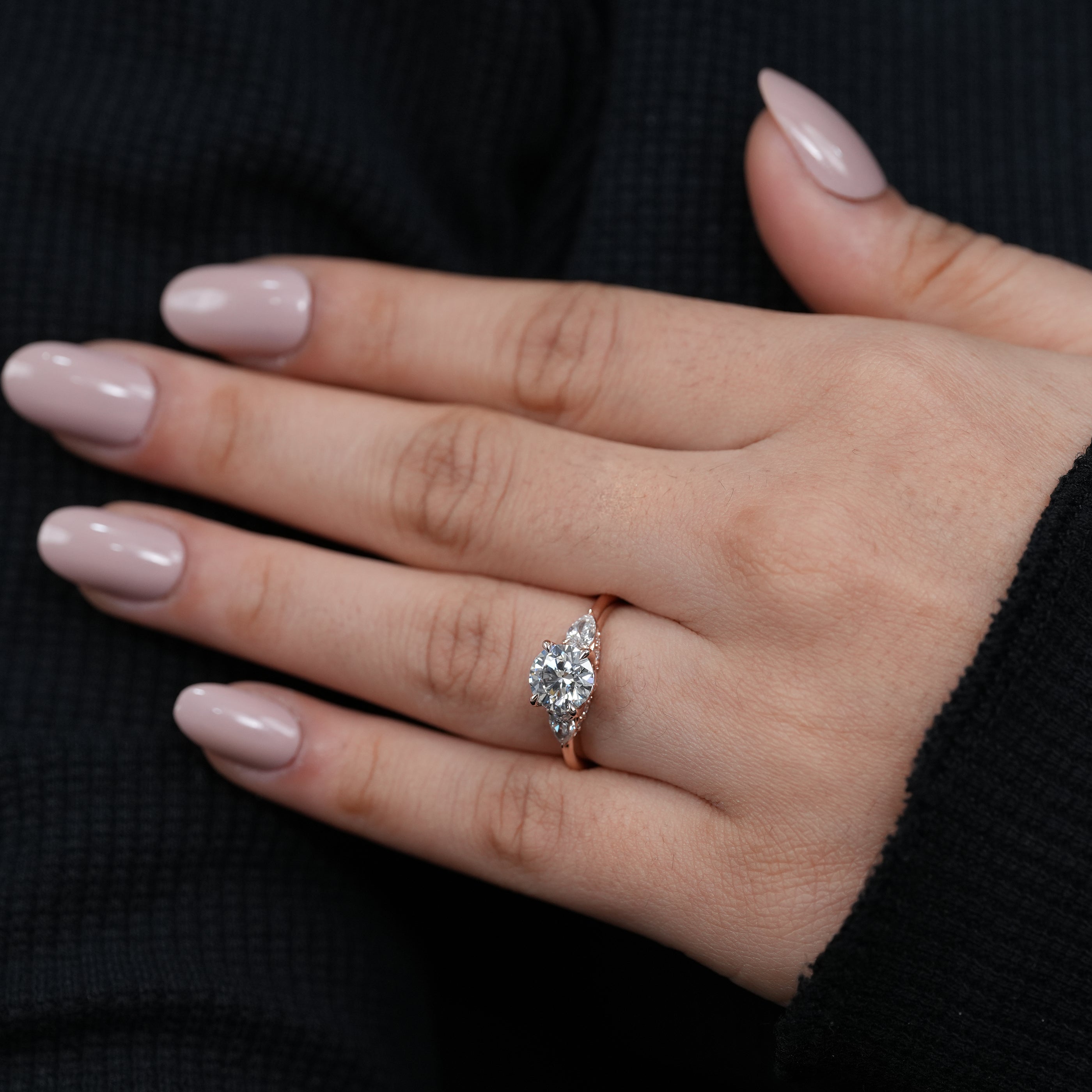 Luxury round lab grown diamond proposal ring tapered pear accents