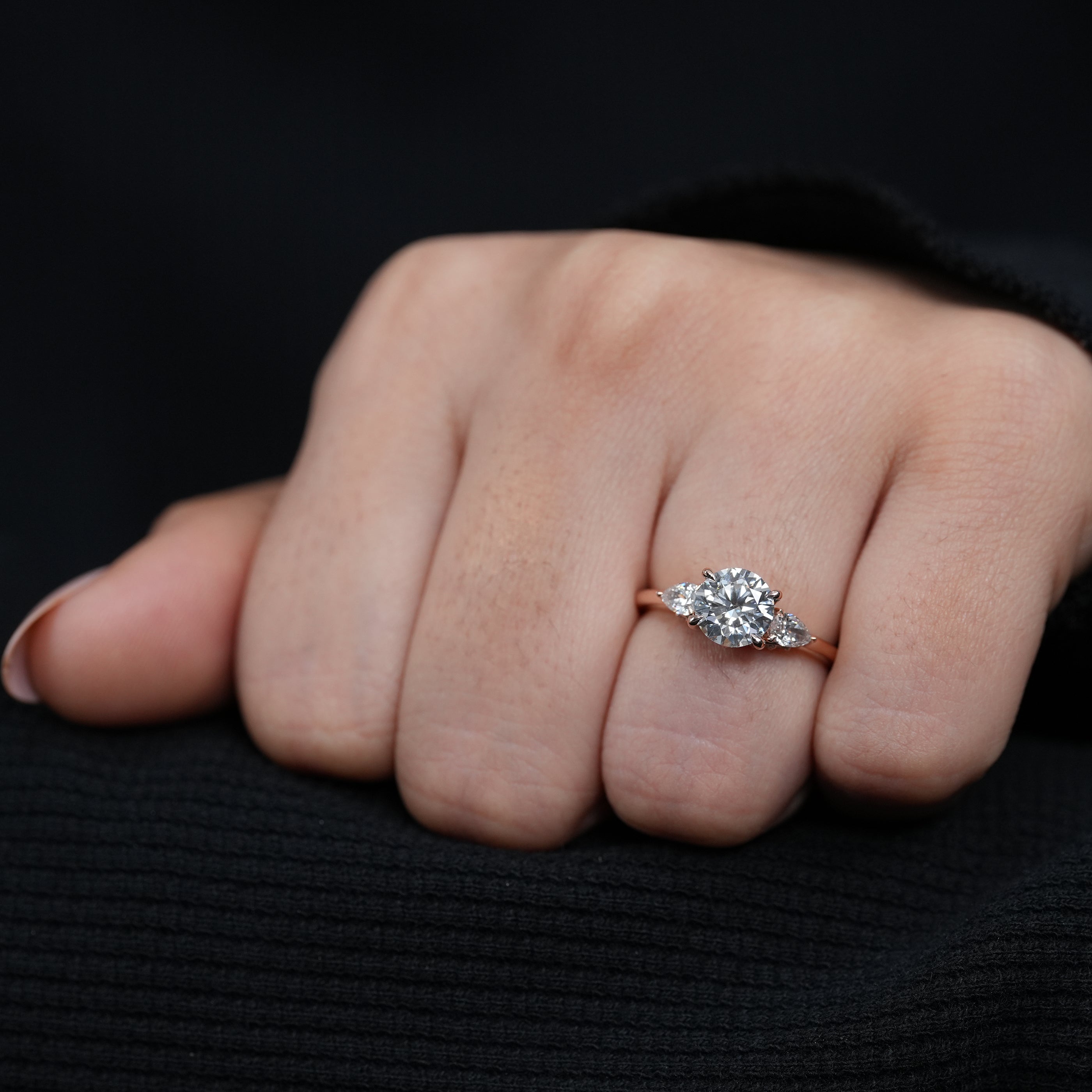 Timeless three stone lab grown diamond engagement ring pear sides