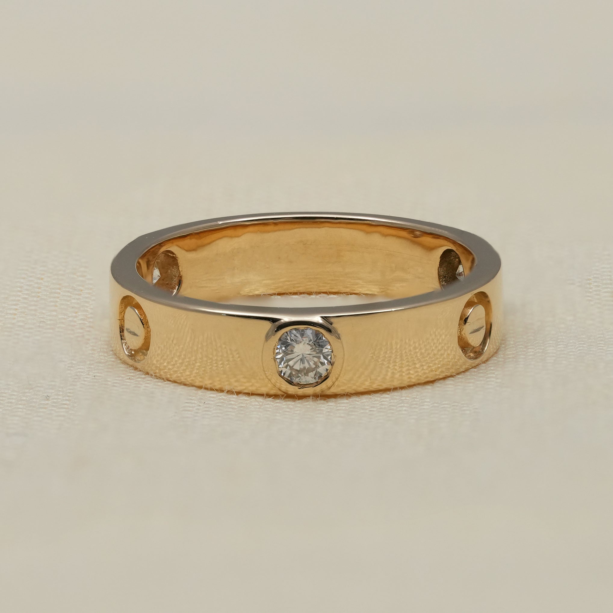 Luxury gold lab grown diamond band with flush round stone settings