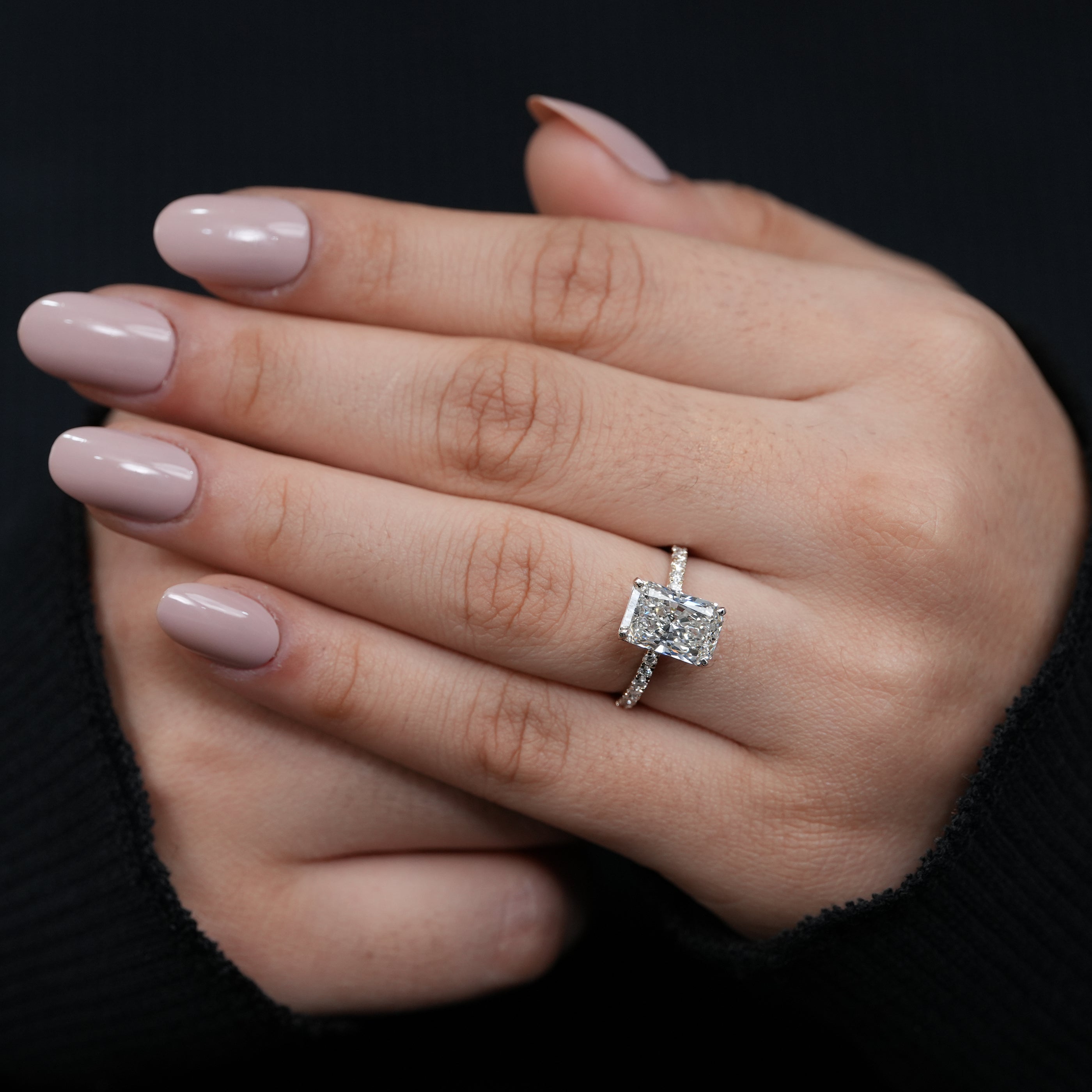Classic lab grown radiant diamond solitaire ring elegant yellow gold pavé setting.