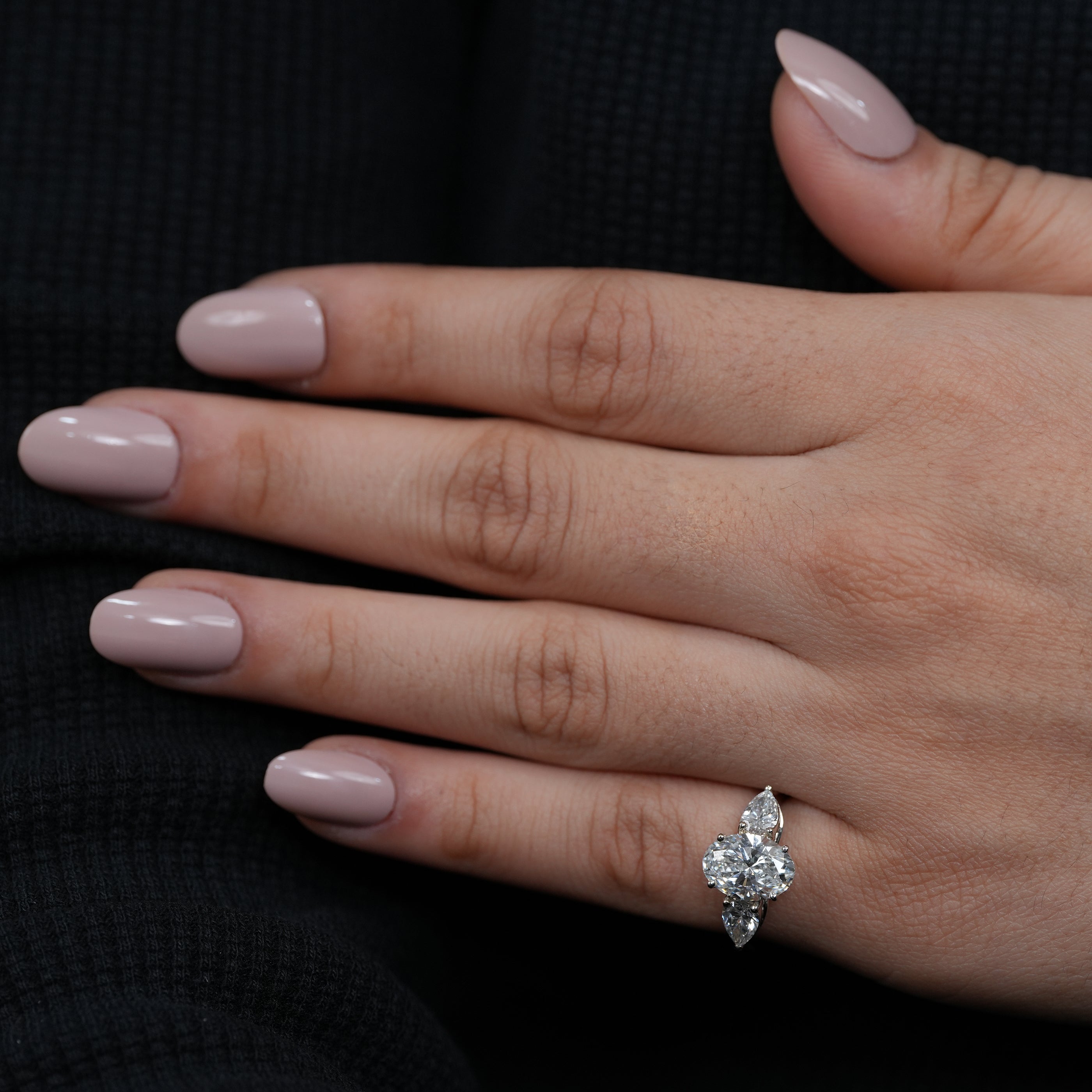 Fine jewelry oval lab grown diamond ring with tapered pear accents
