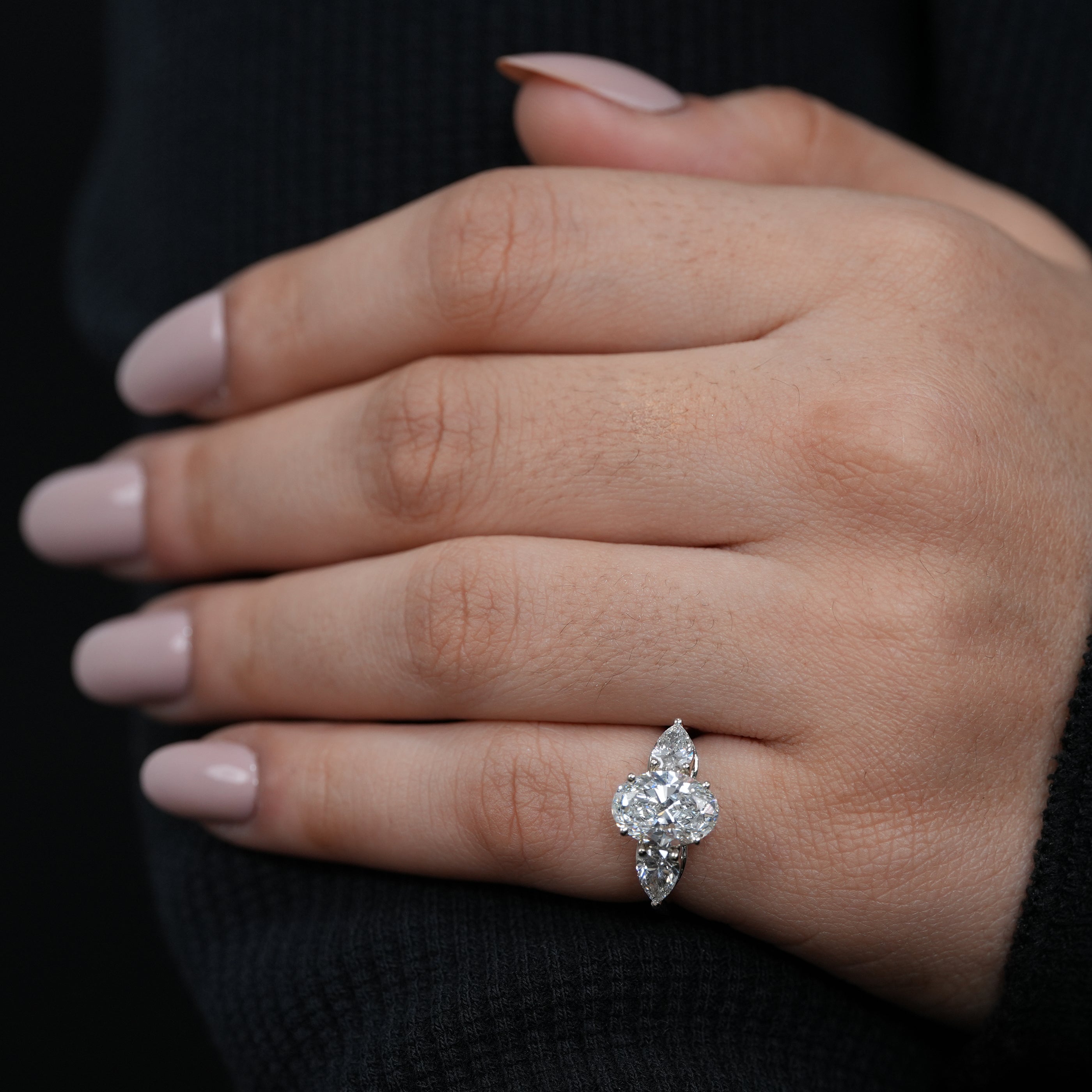 Classic three stone oval lab grown diamond engagement ring white metal setting