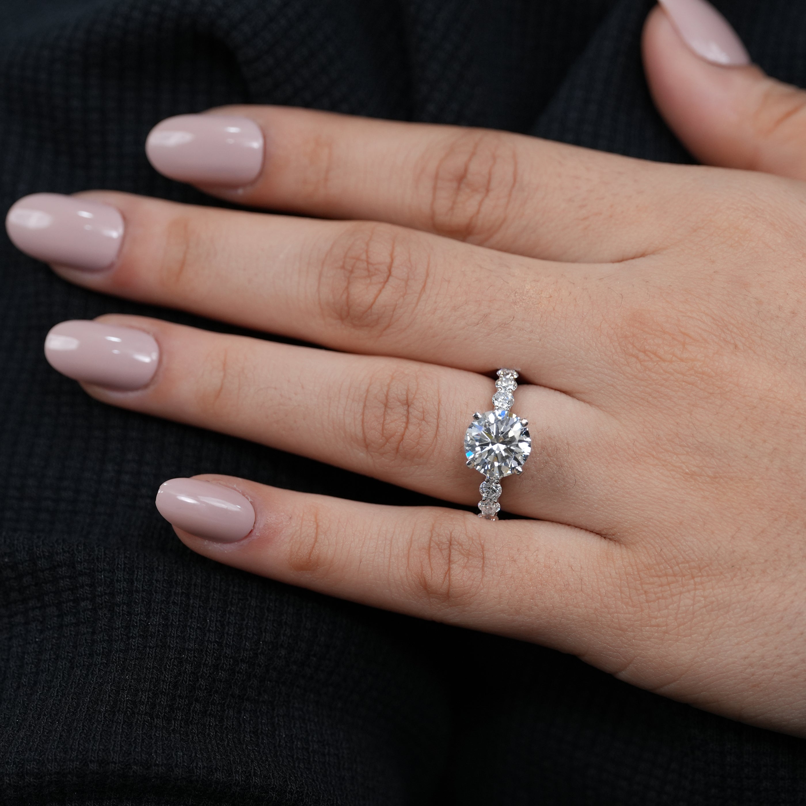 Elegant round lab grown diamond proposal ring shimmering pavé band fine jewelry