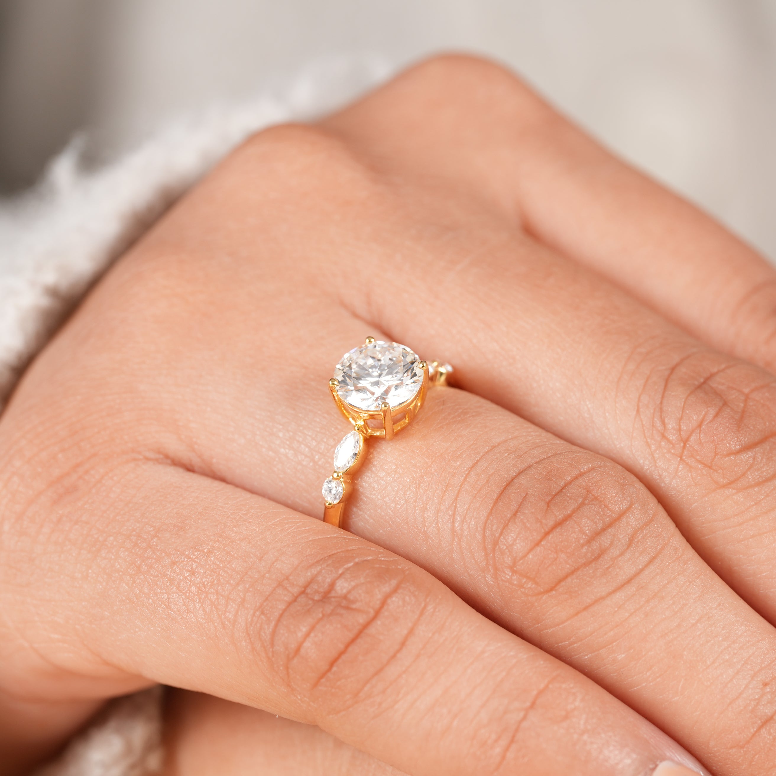 Minimalist round diamond ring with floral inspired side stone details