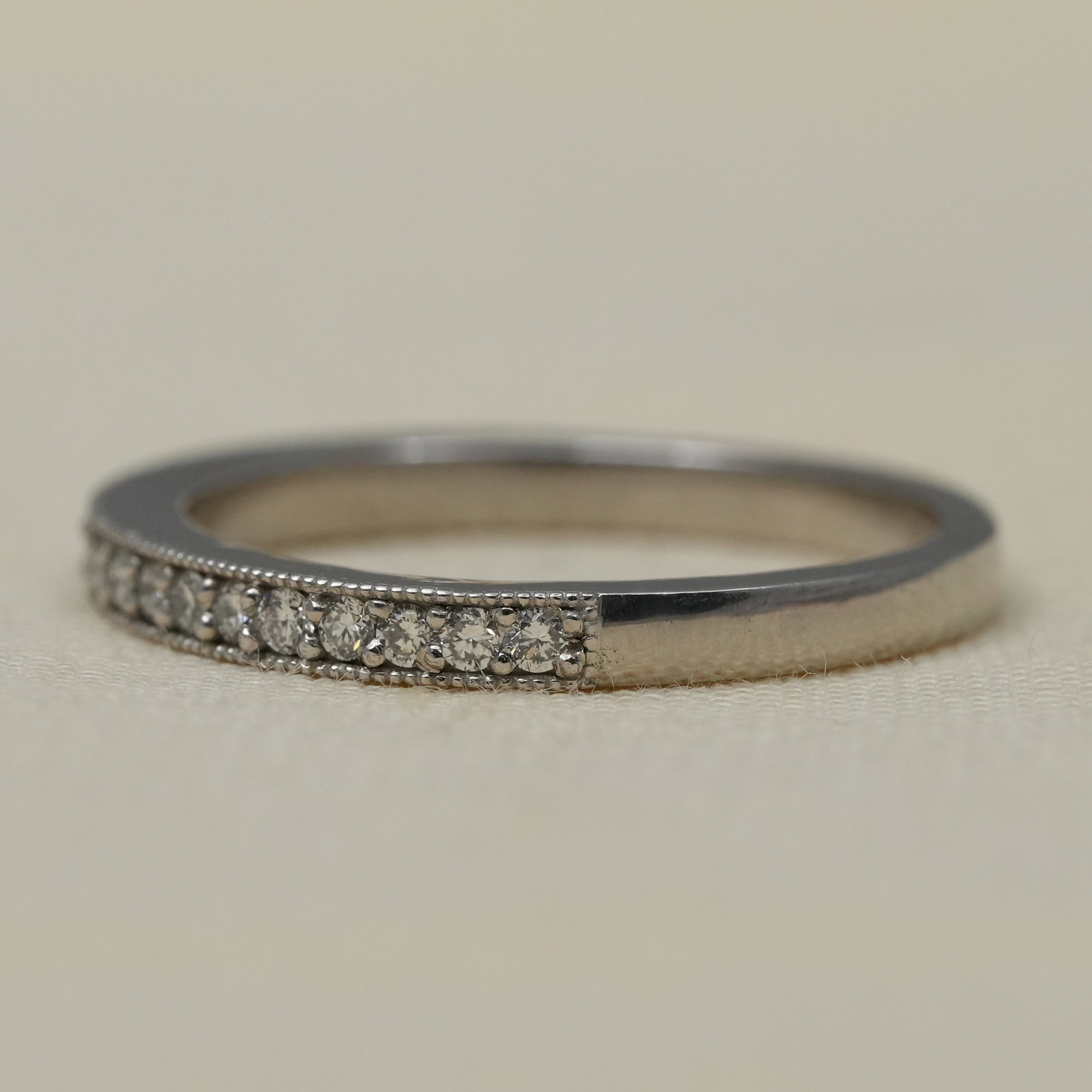 Elegant white gold wedding band featuring pavé lab grown diamond sparkle