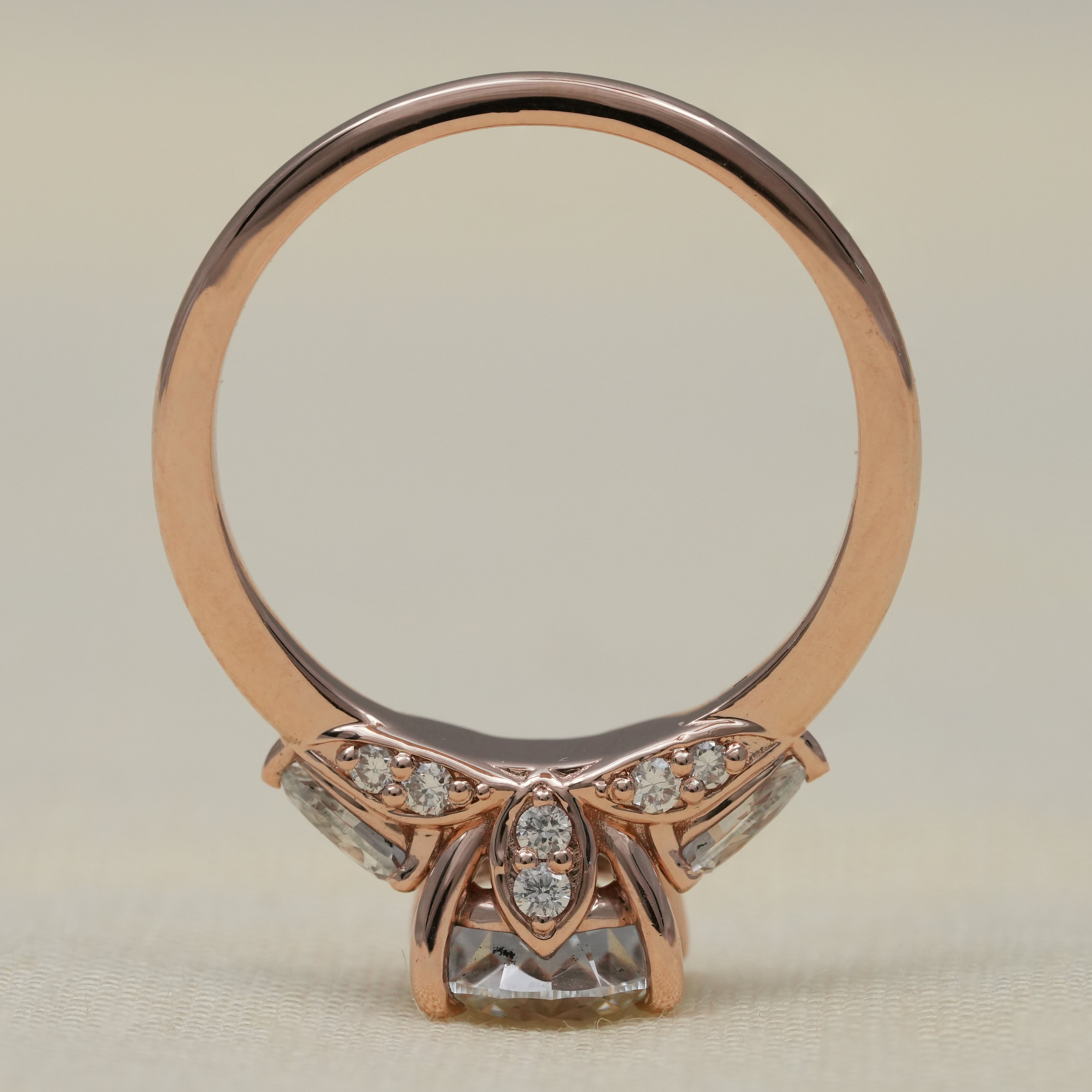 Three Stone Round Lab Diamond Engagement Ring with Pear Side Stones