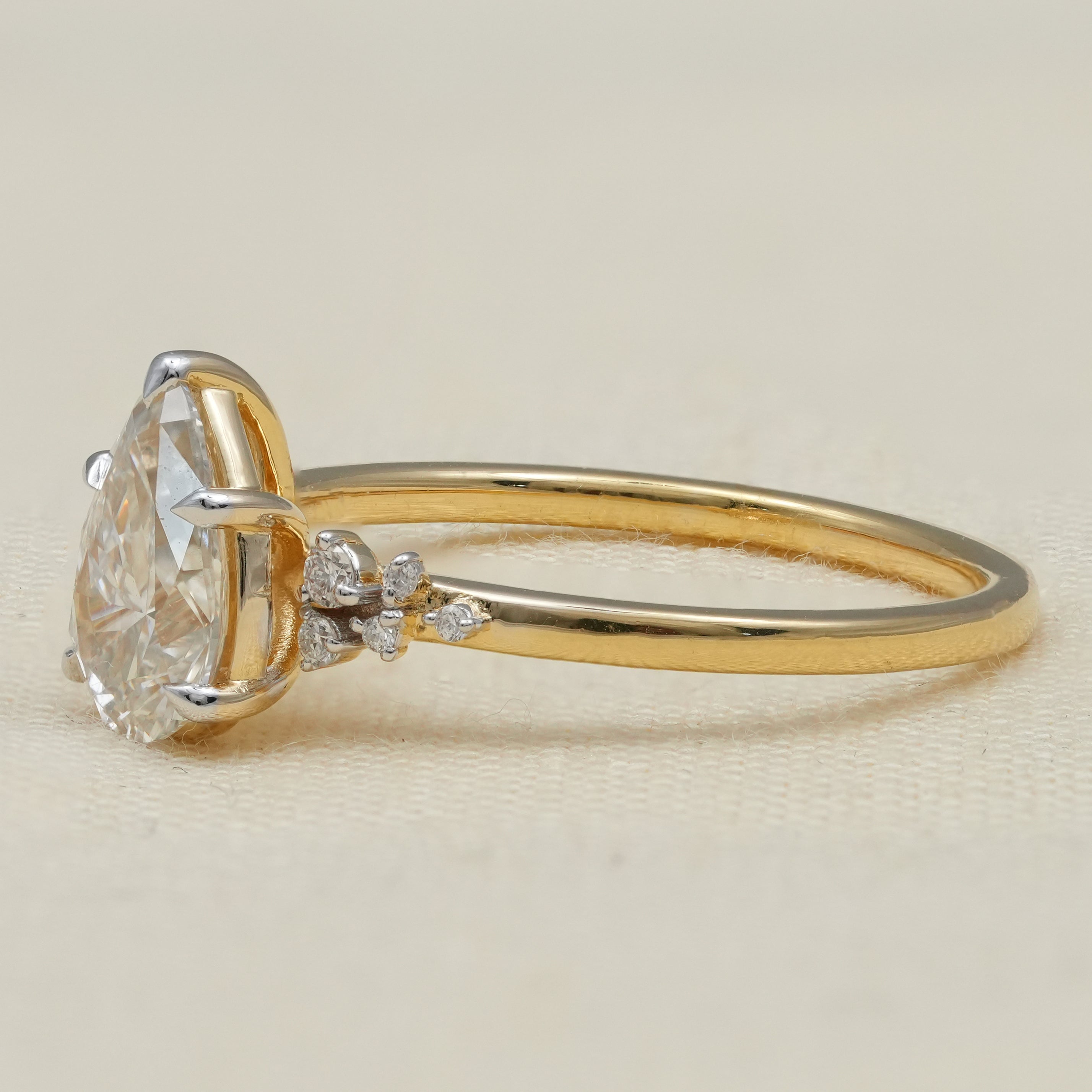 Fine jewelry pear lab grown diamond engagement ring with delicate gold band
