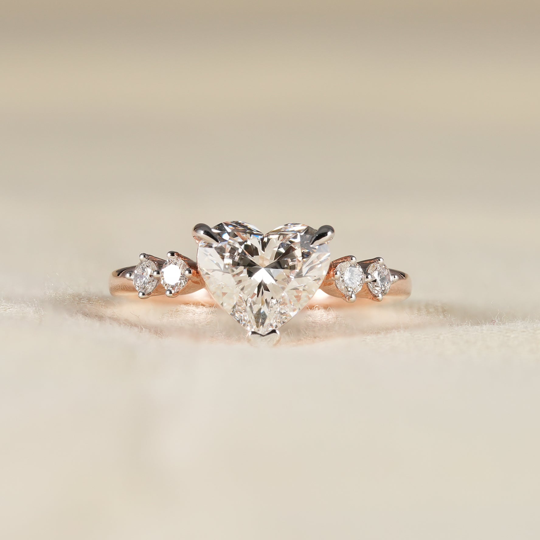 Heart Shaped Lab Grown Diamond Engagement Ring in Rose Gold with Round Side Diamonds