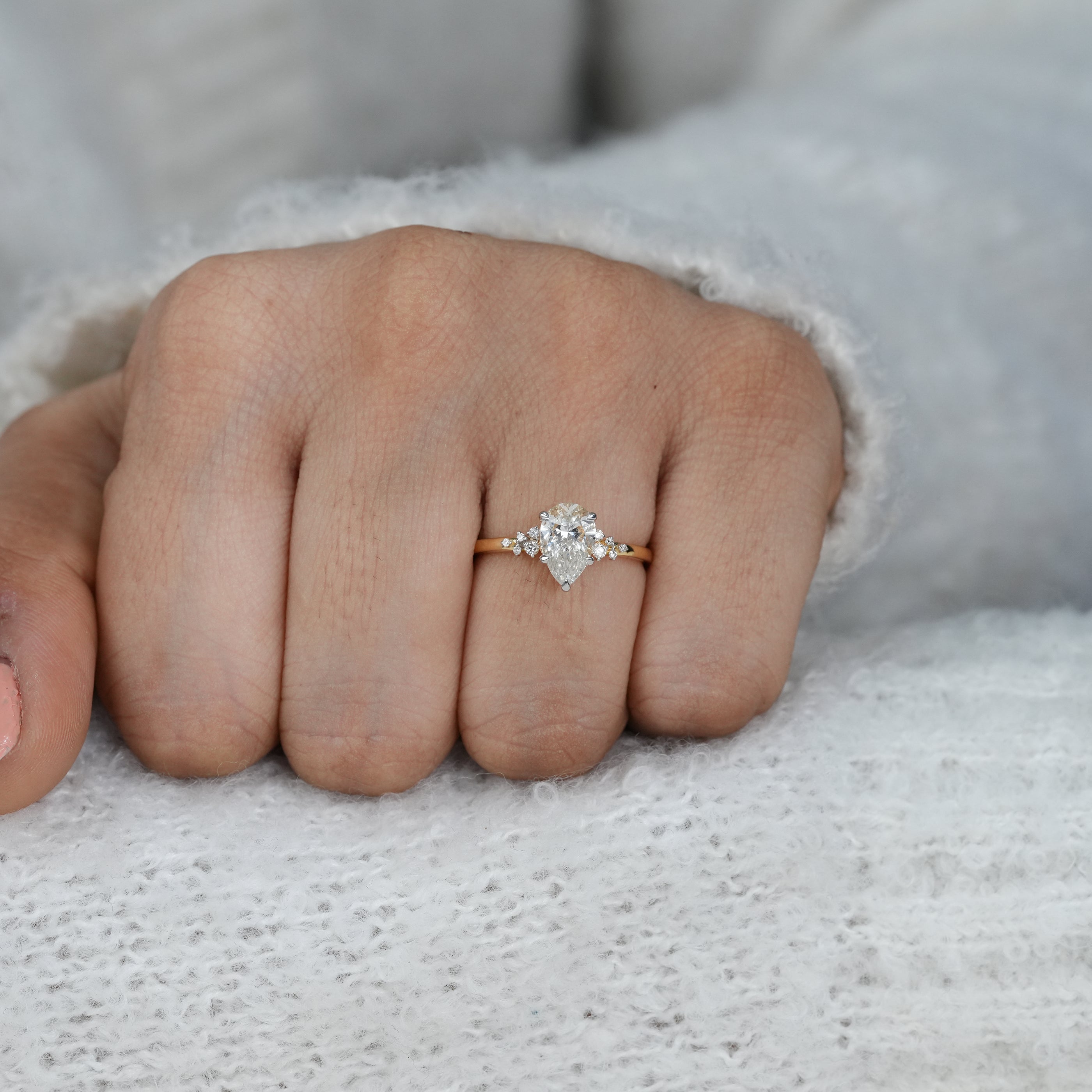 Minimalist gold ring with pear lab grown diamond and subtle side sparkle