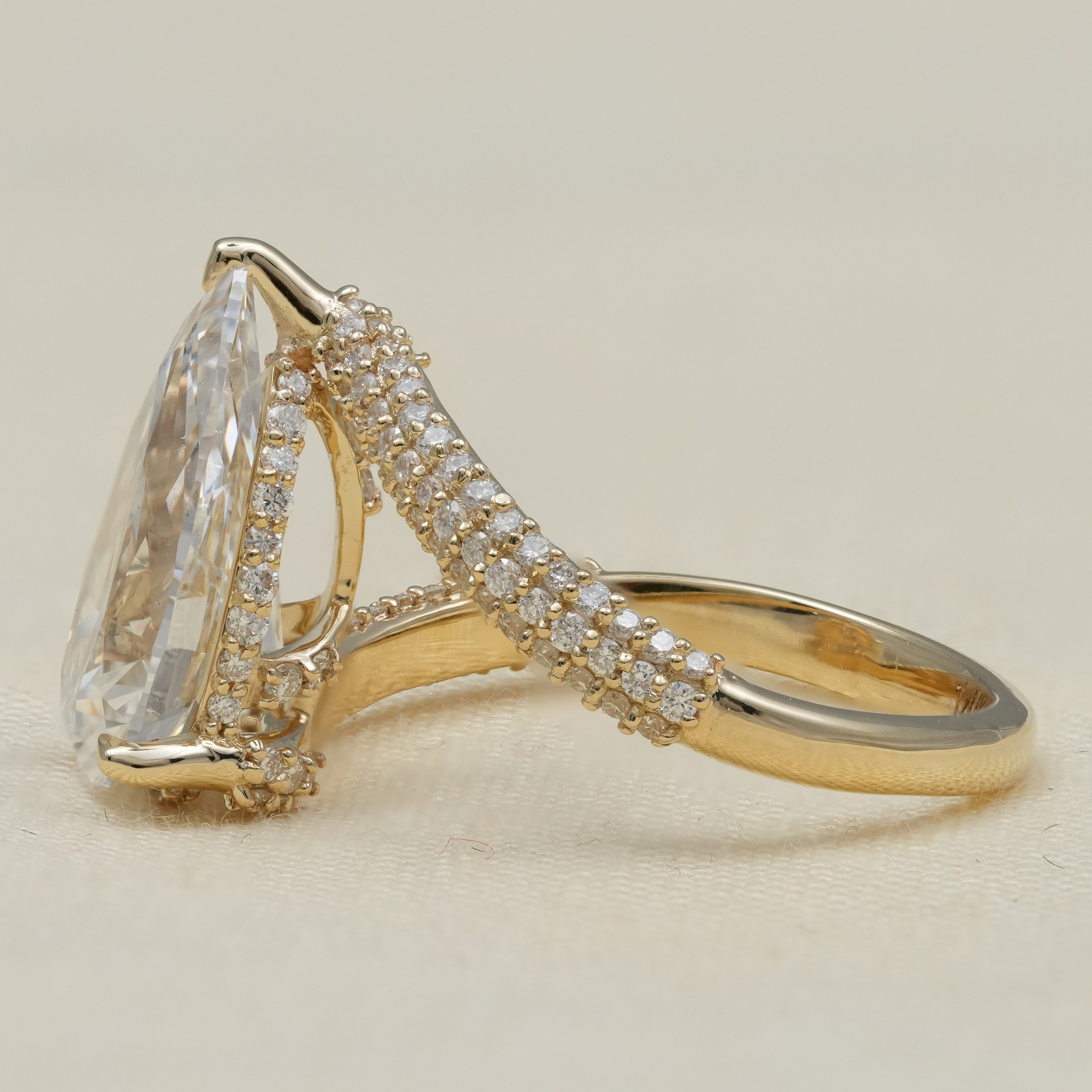 Fine jewelry pear lab grown diamond engagement ring with brilliant pavé