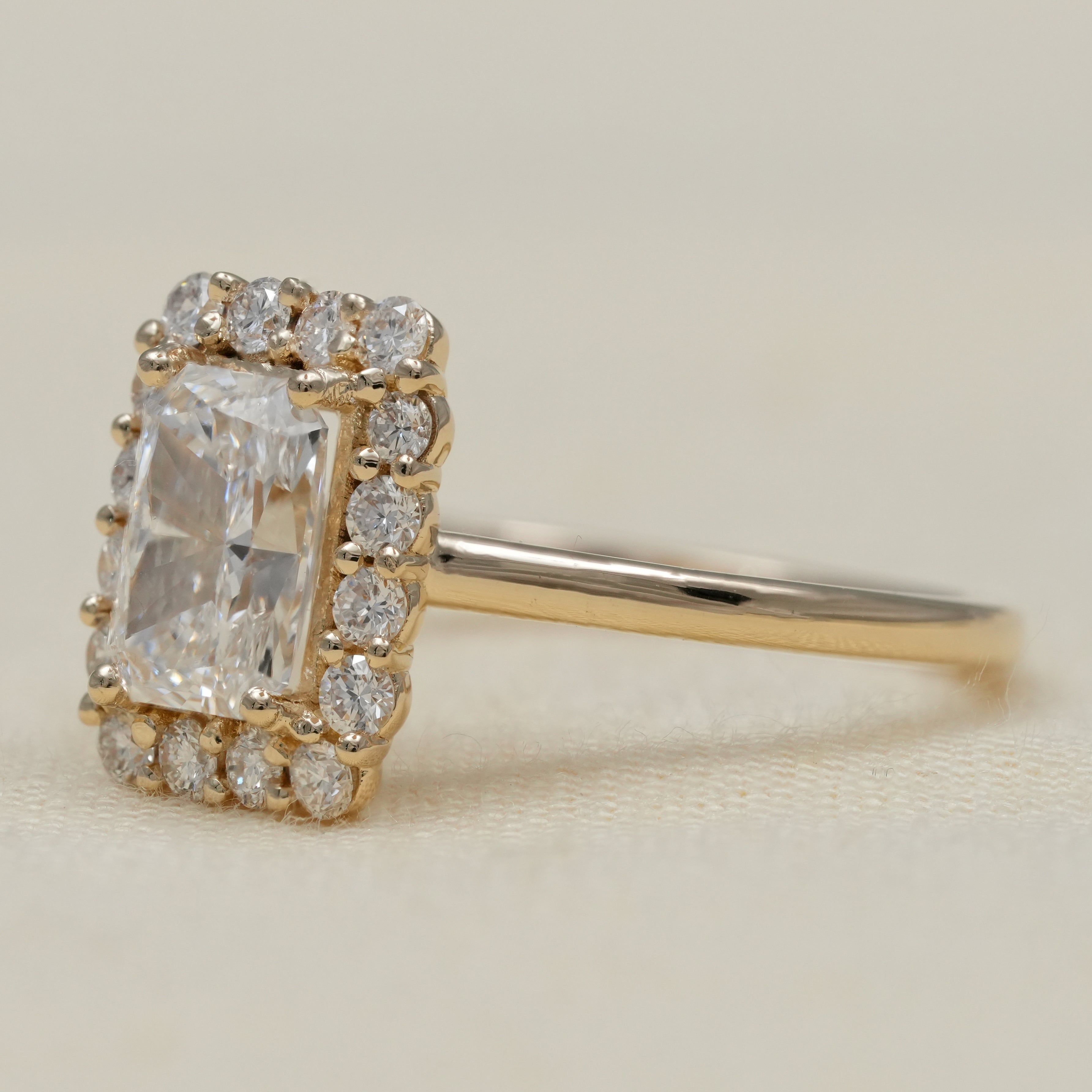 Luxury rectangular radiant lab grown diamond halo ring in yellow gold