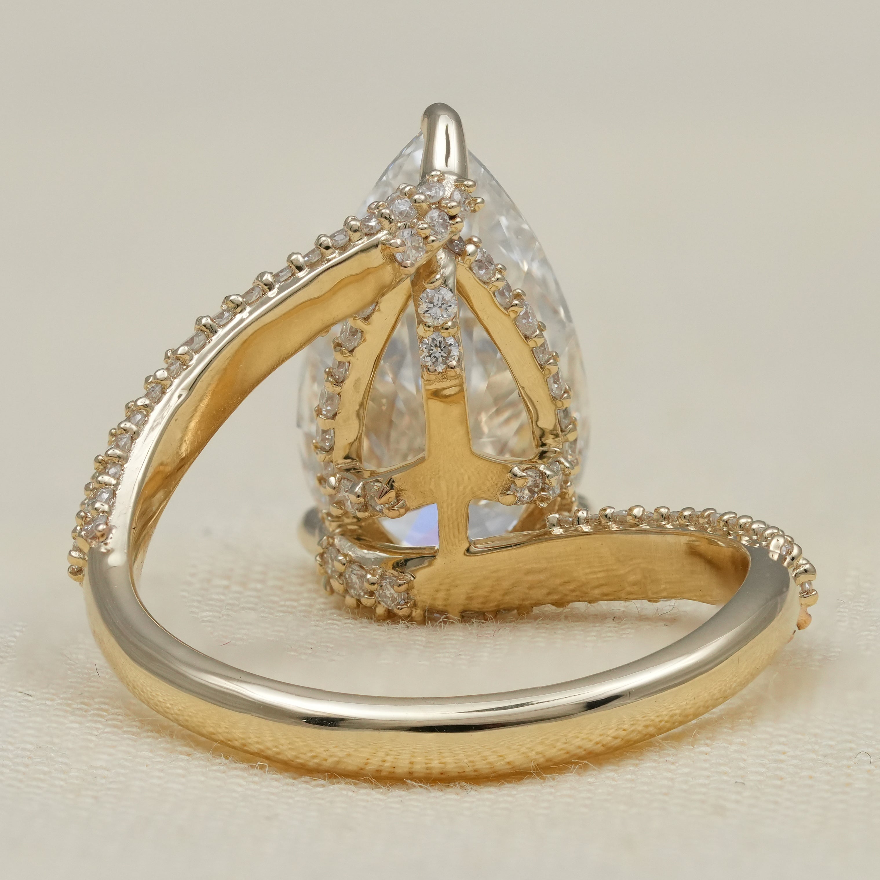 Romantic pear lab grown diamond ring with shimmering pavé band
