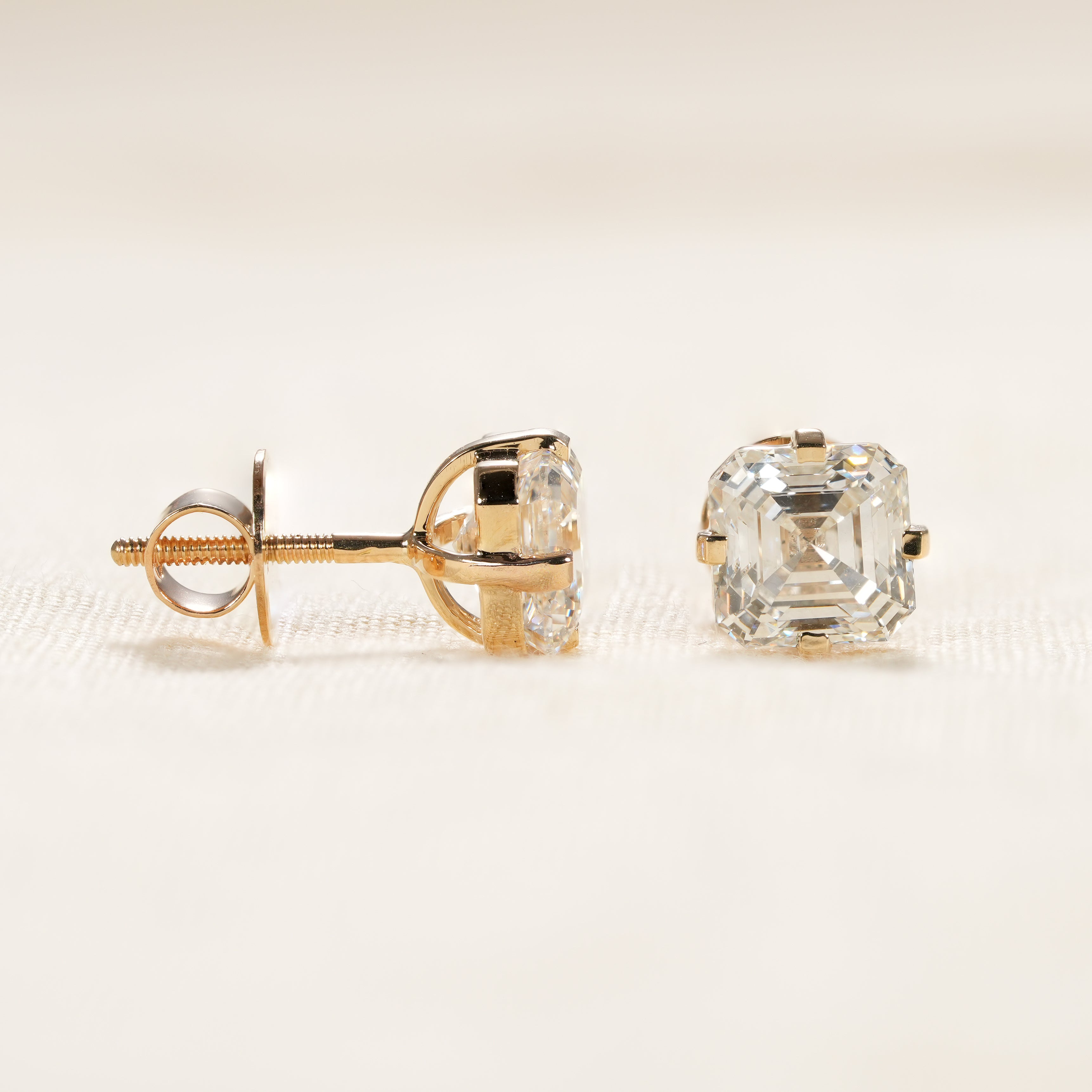 Vintage inspired Asscher cut diamond earrings with step cut brilliance
