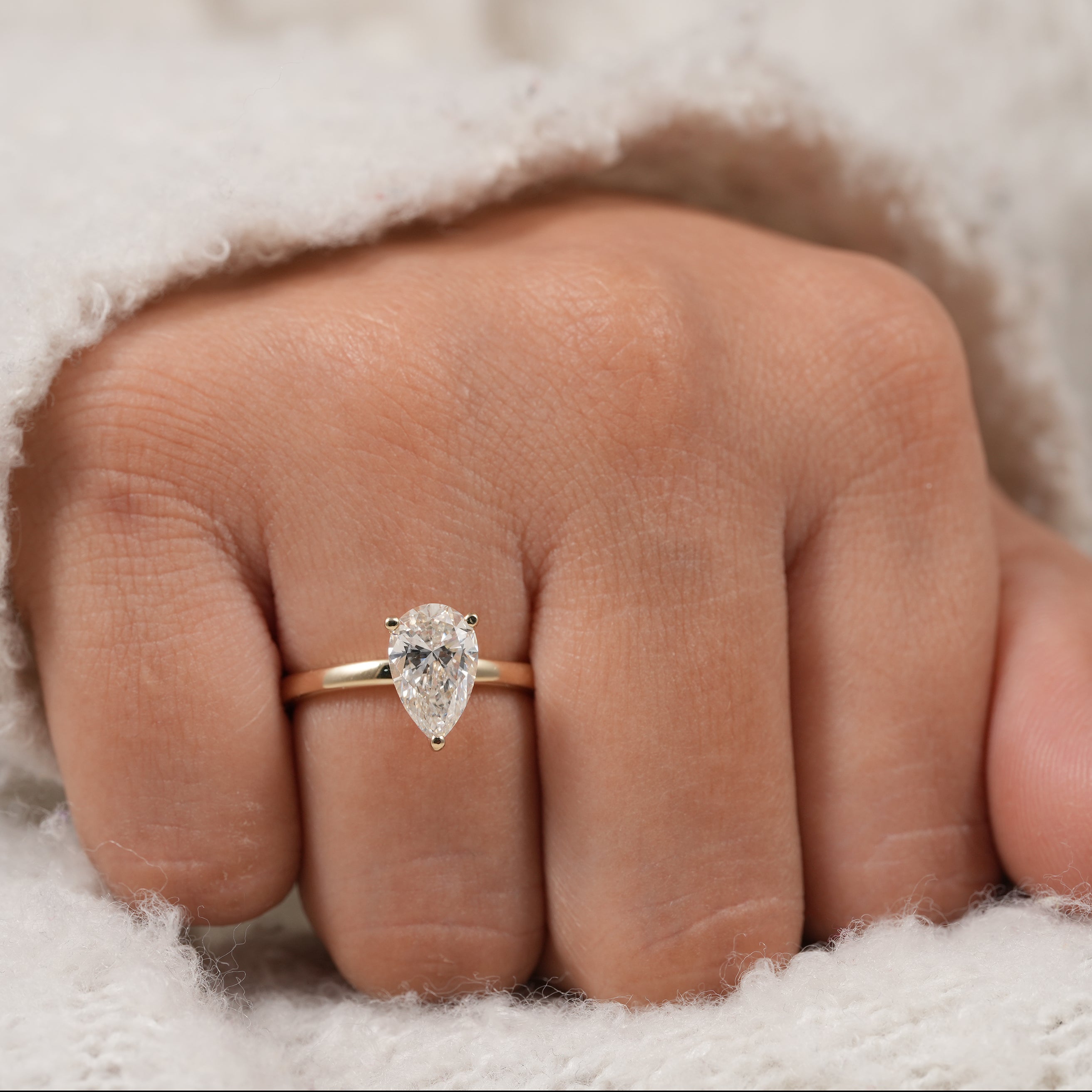 Pear solitaire lab created diamond ring for bridal and proposal jewelry