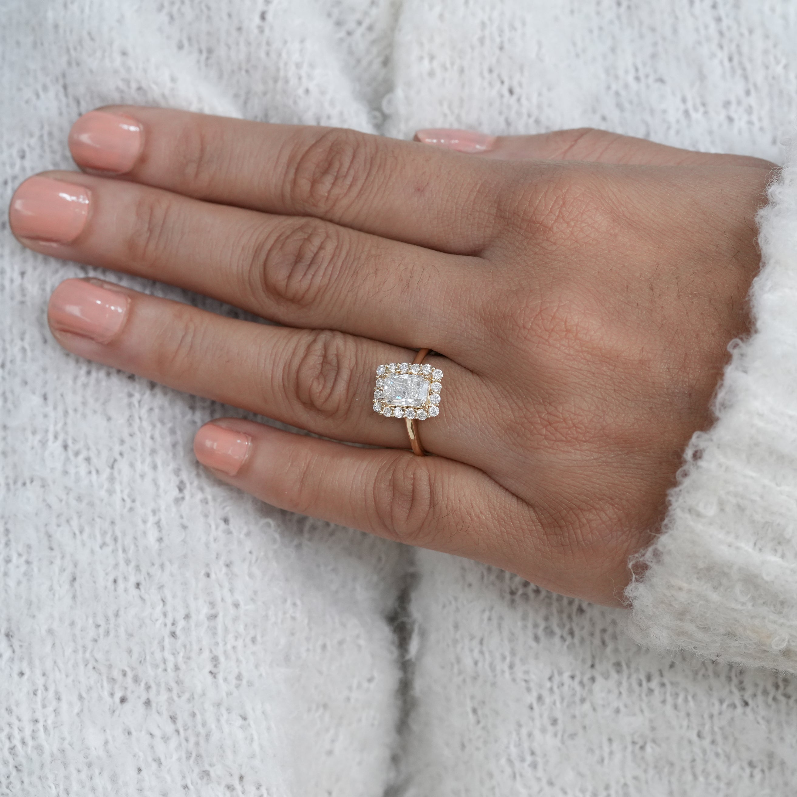 Classic rectangular radiant lab grown diamond engagement ring with halo