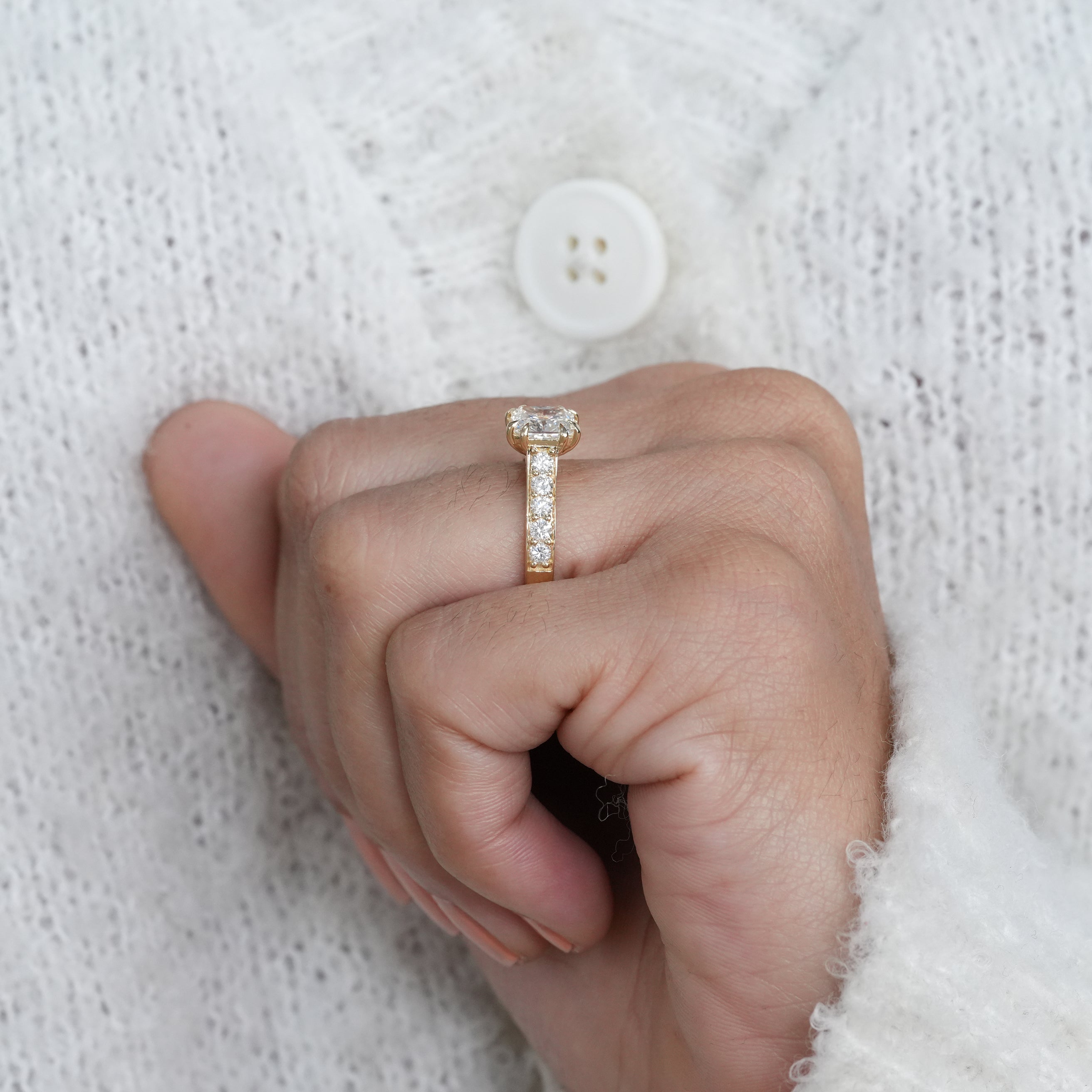 Timeless square radiant lab grown diamond ring with brilliant shoulders