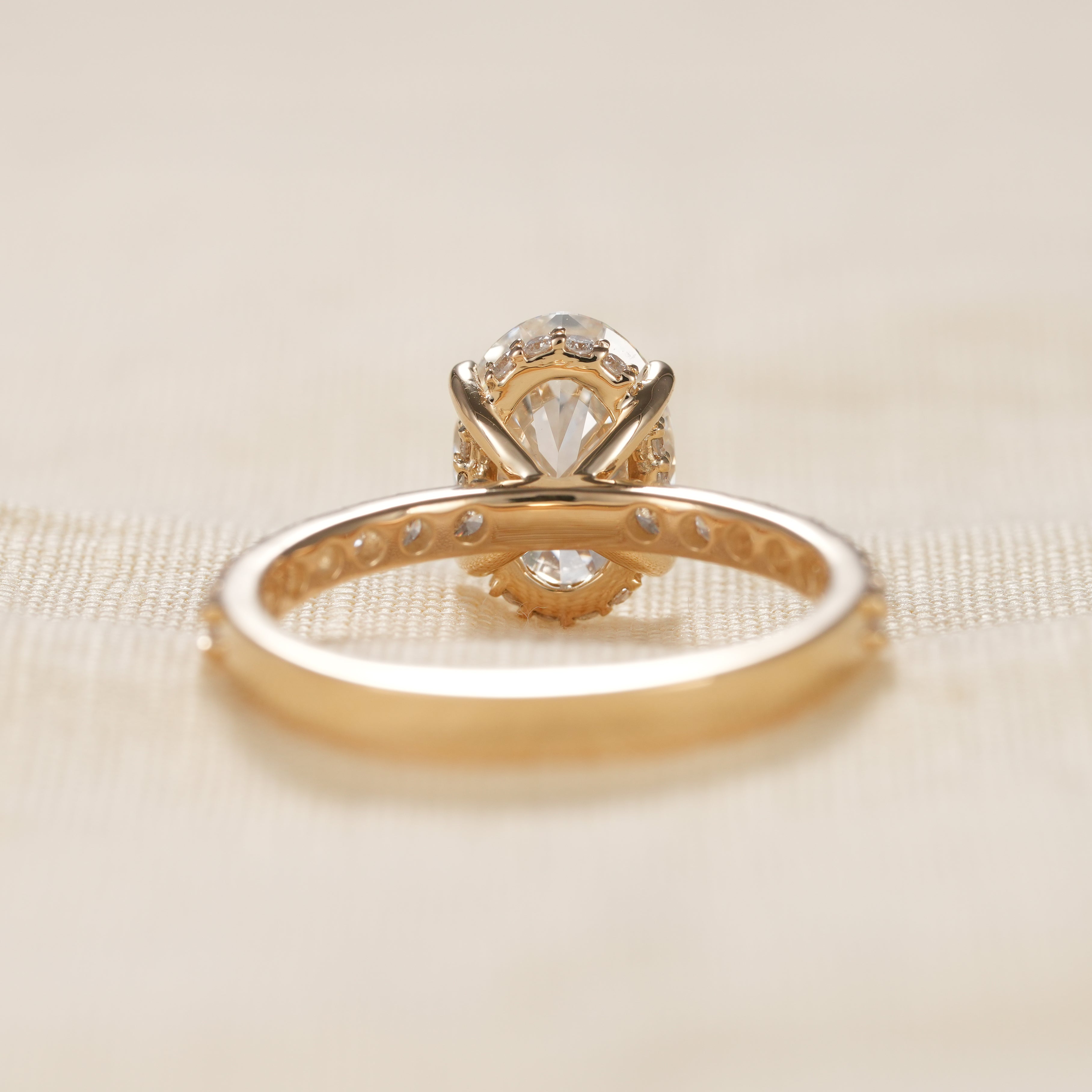 Luxury oval cut diamond engagement ring with slim pavé gold band