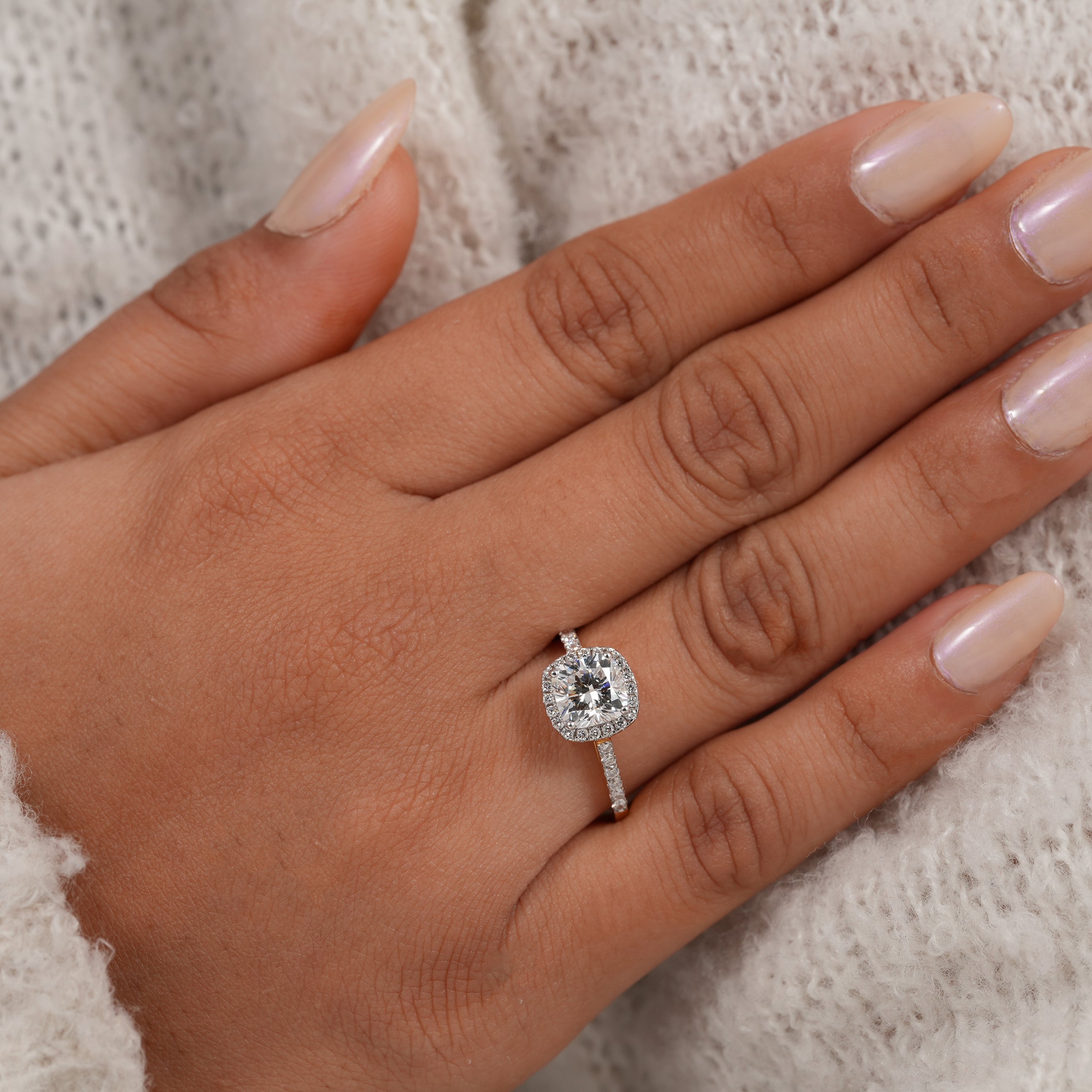 Cushion cut lab created diamond engagement ring with refined halo setting