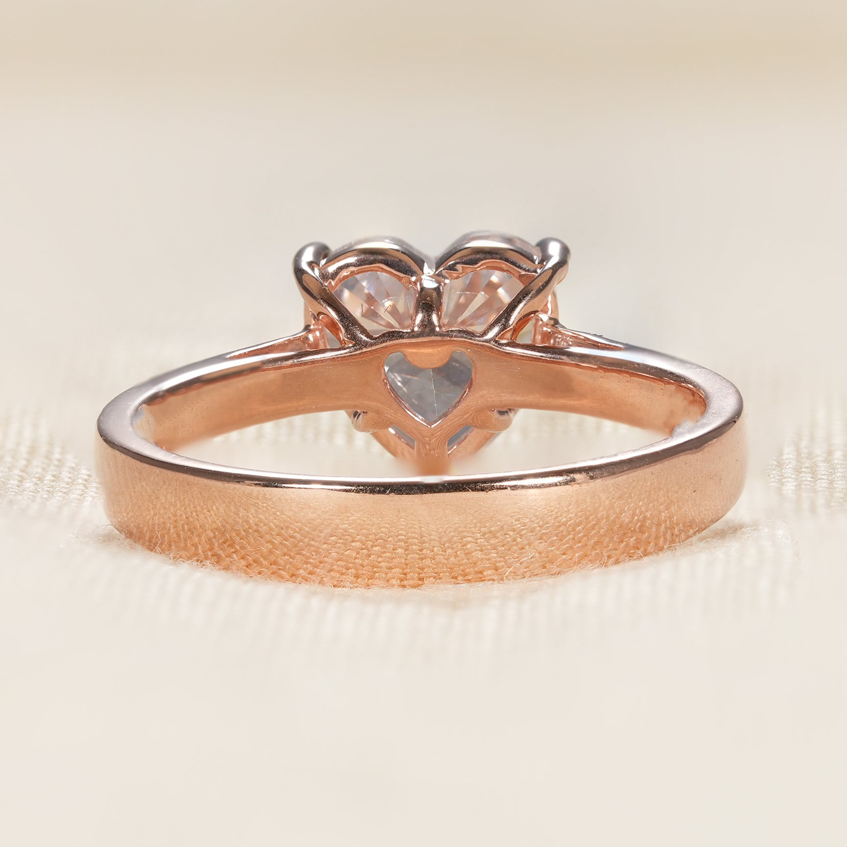Solitaire heart diamond engagement ring with modern minimalist style