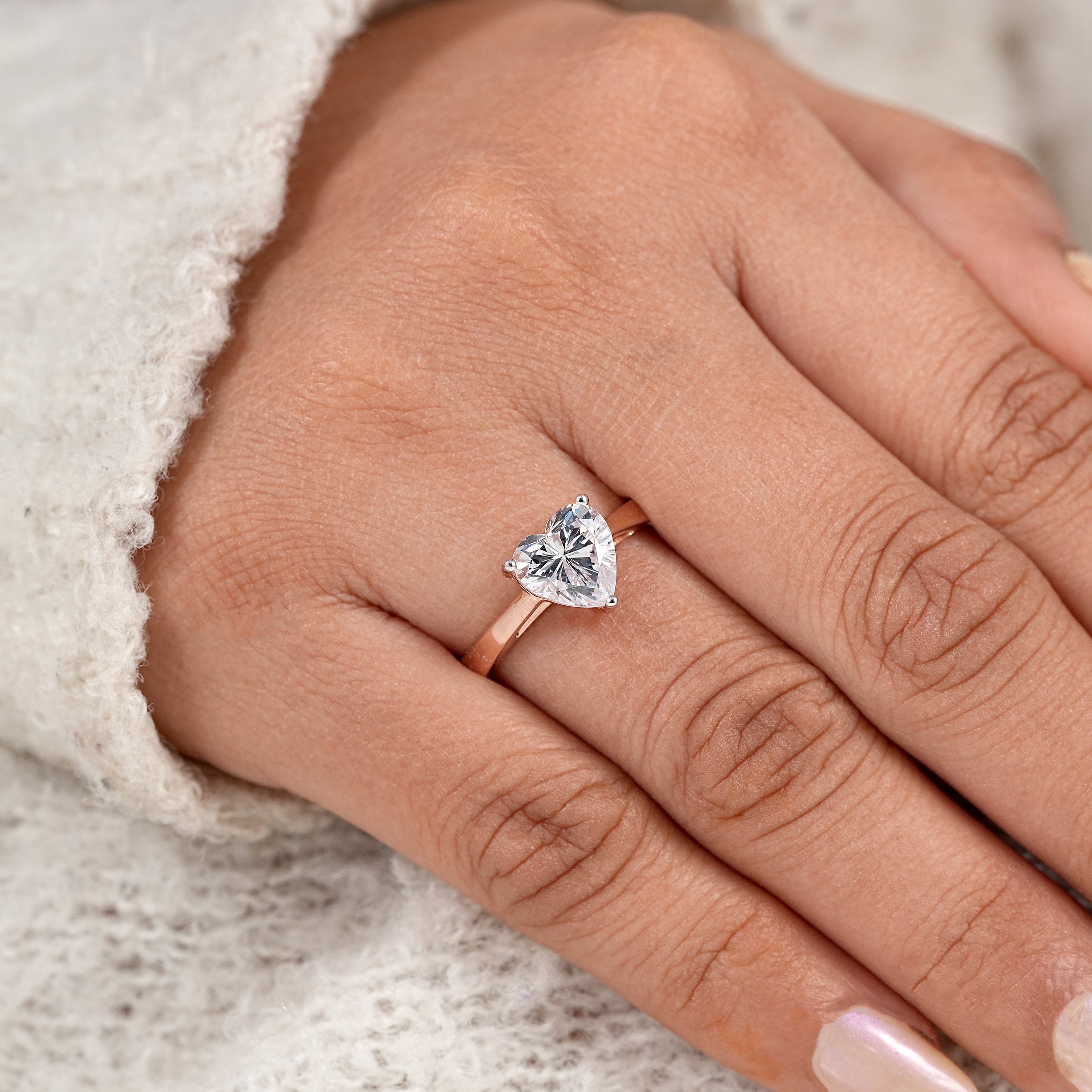 Timeless heart cut engagement ring with polished rose gold band