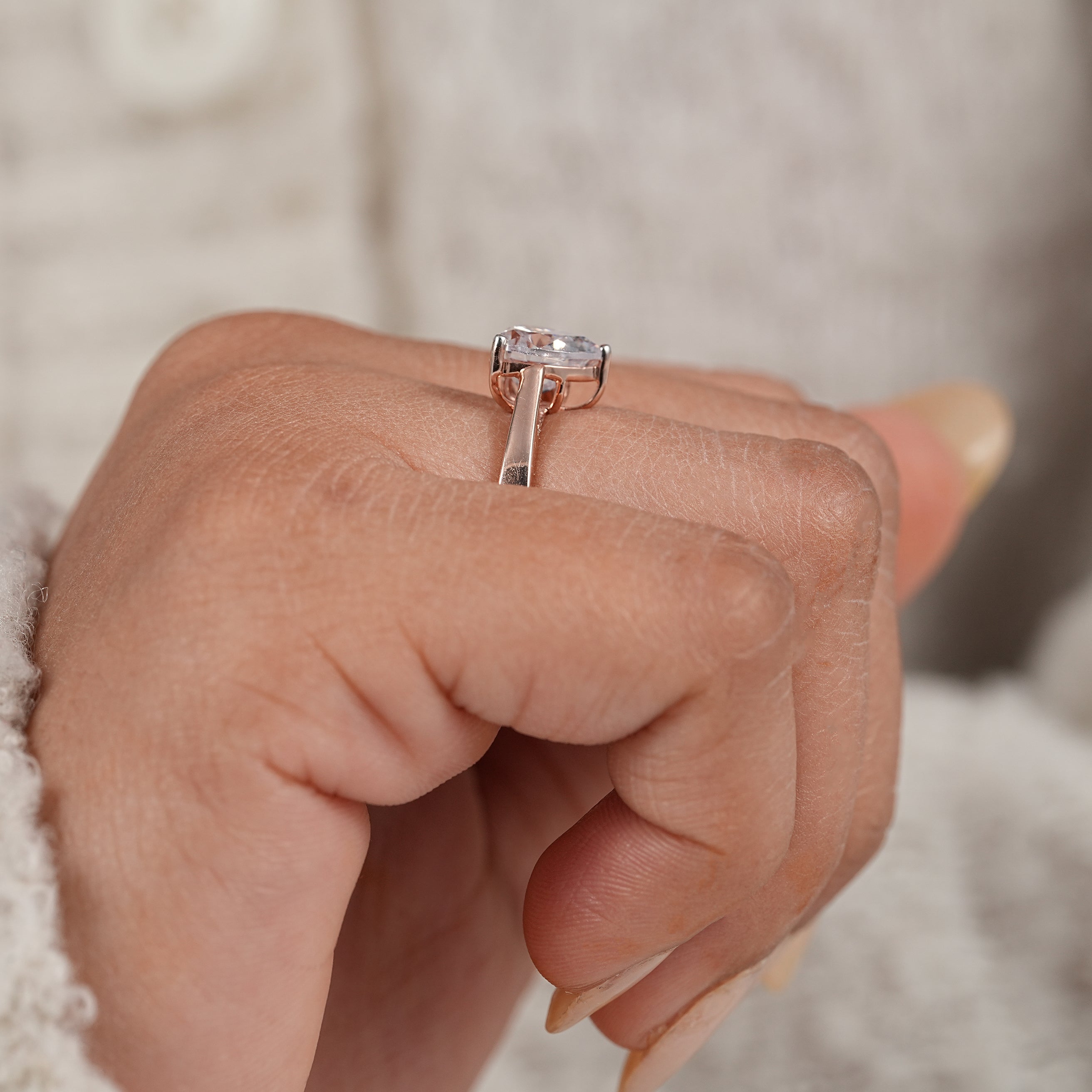 Minimalist bridal ring featuring heart shaped lab diamond solitaire