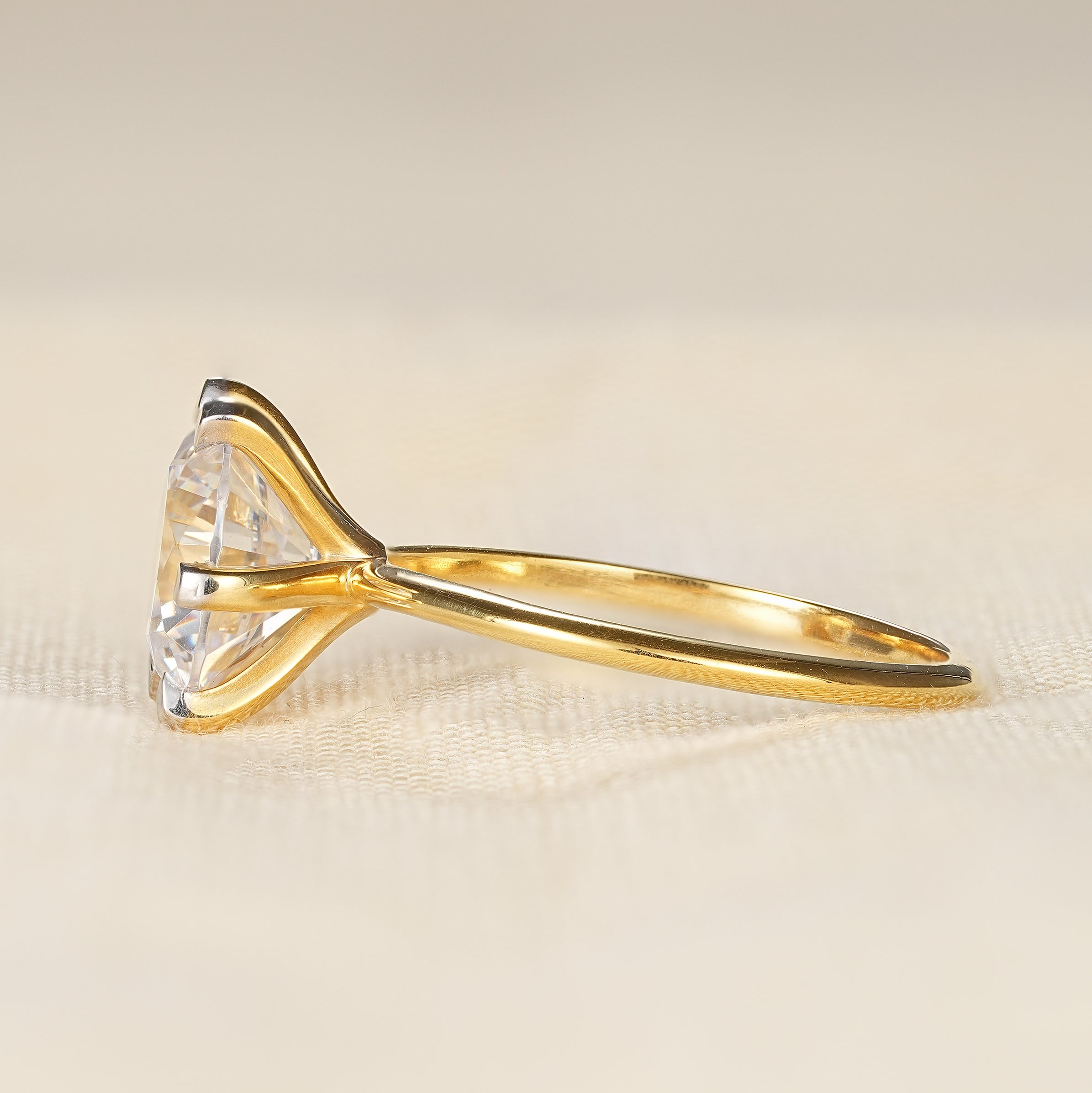 Minimalist round lab diamond ring with classic six prong design