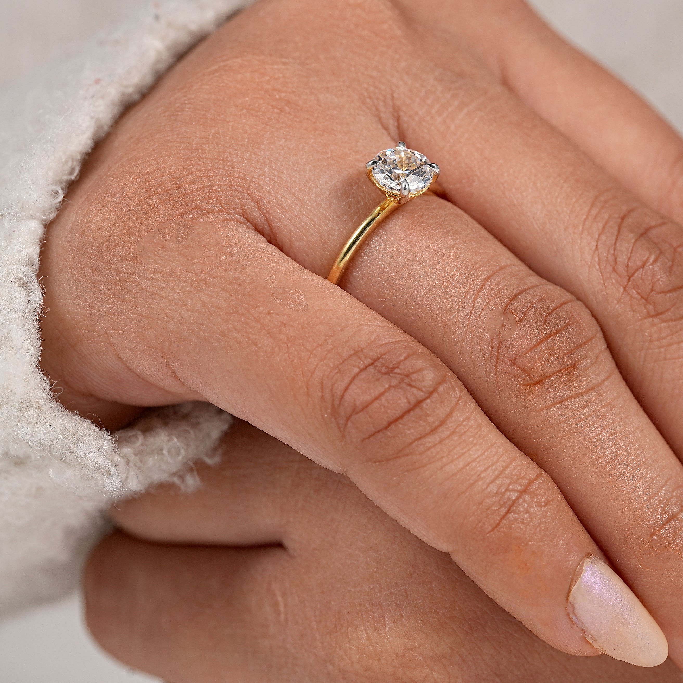 Elegant round diamond bridal ring with minimalist yellow gold design