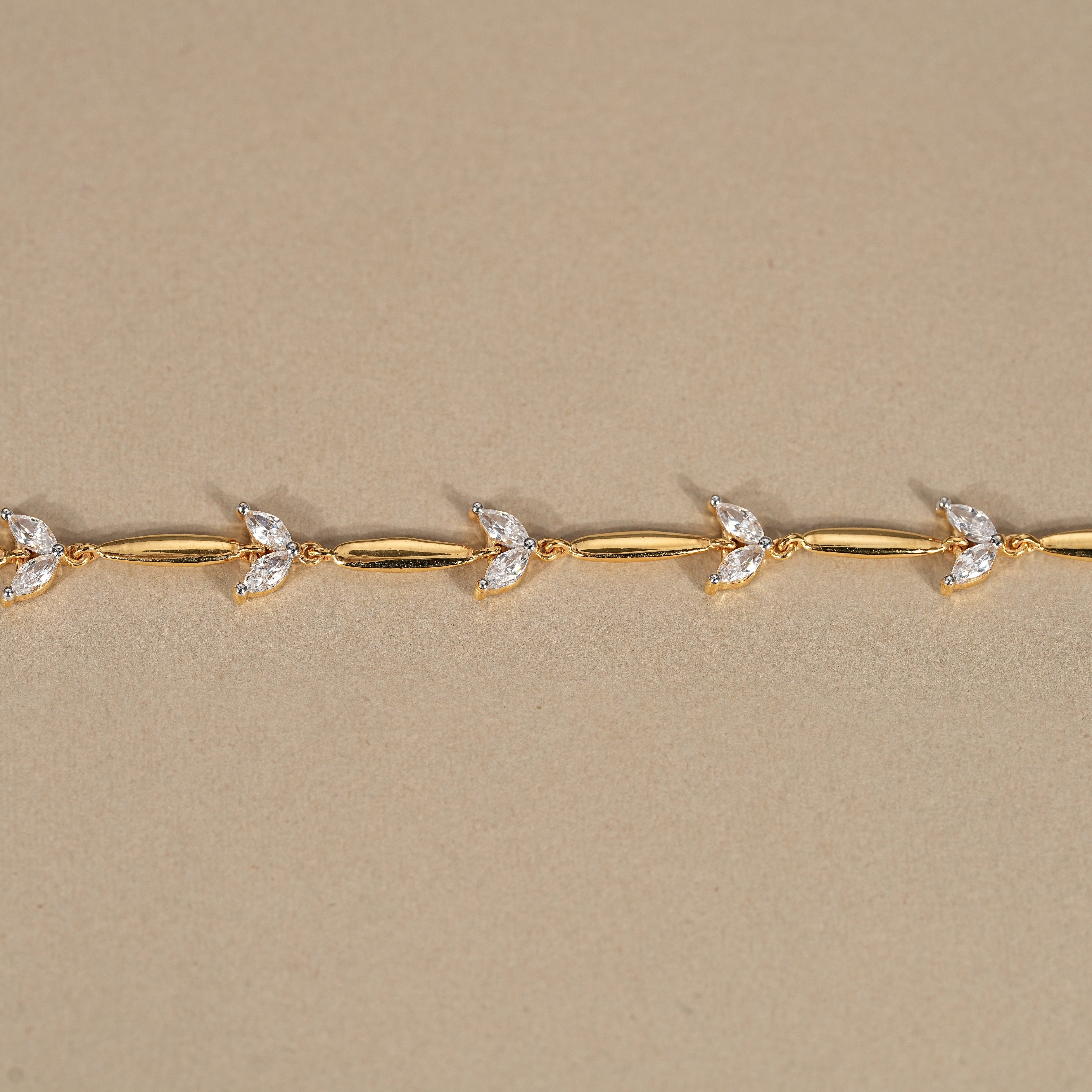 Elegant yellow gold station bracelet with marquise lab grown diamonds