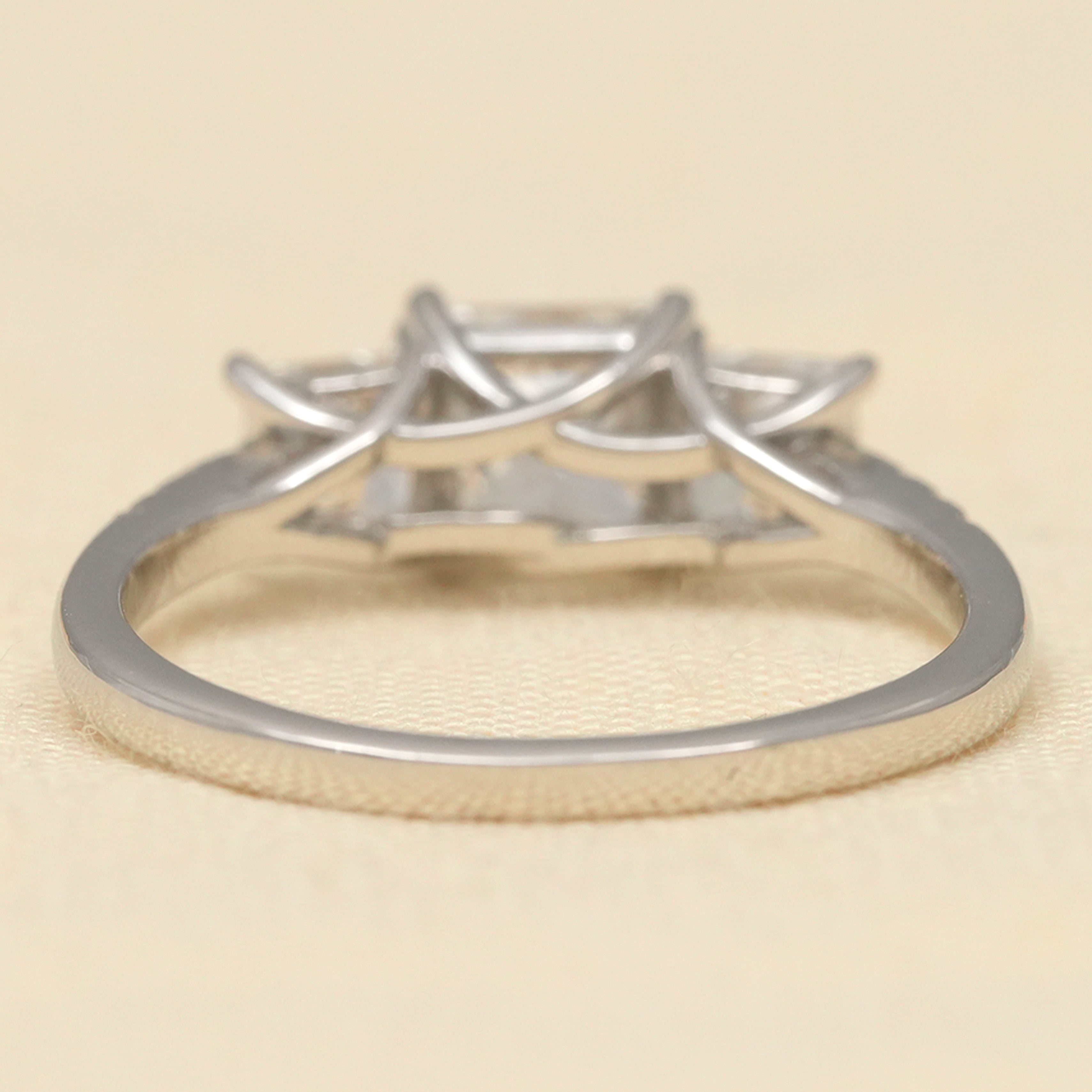 Sophisticated three stone ring highlighting princess cut lab grown diamond beauty