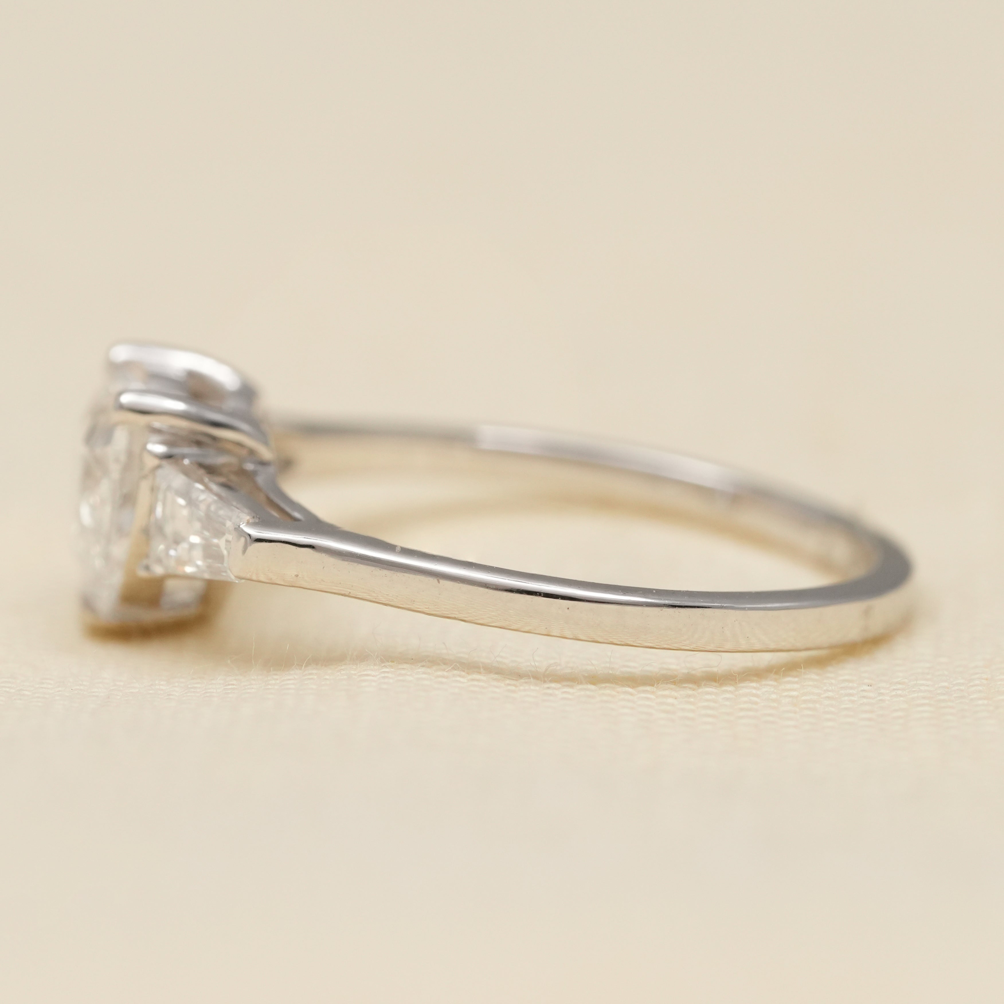 Heart shaped lab grown diamond ring with classic baguette side stones