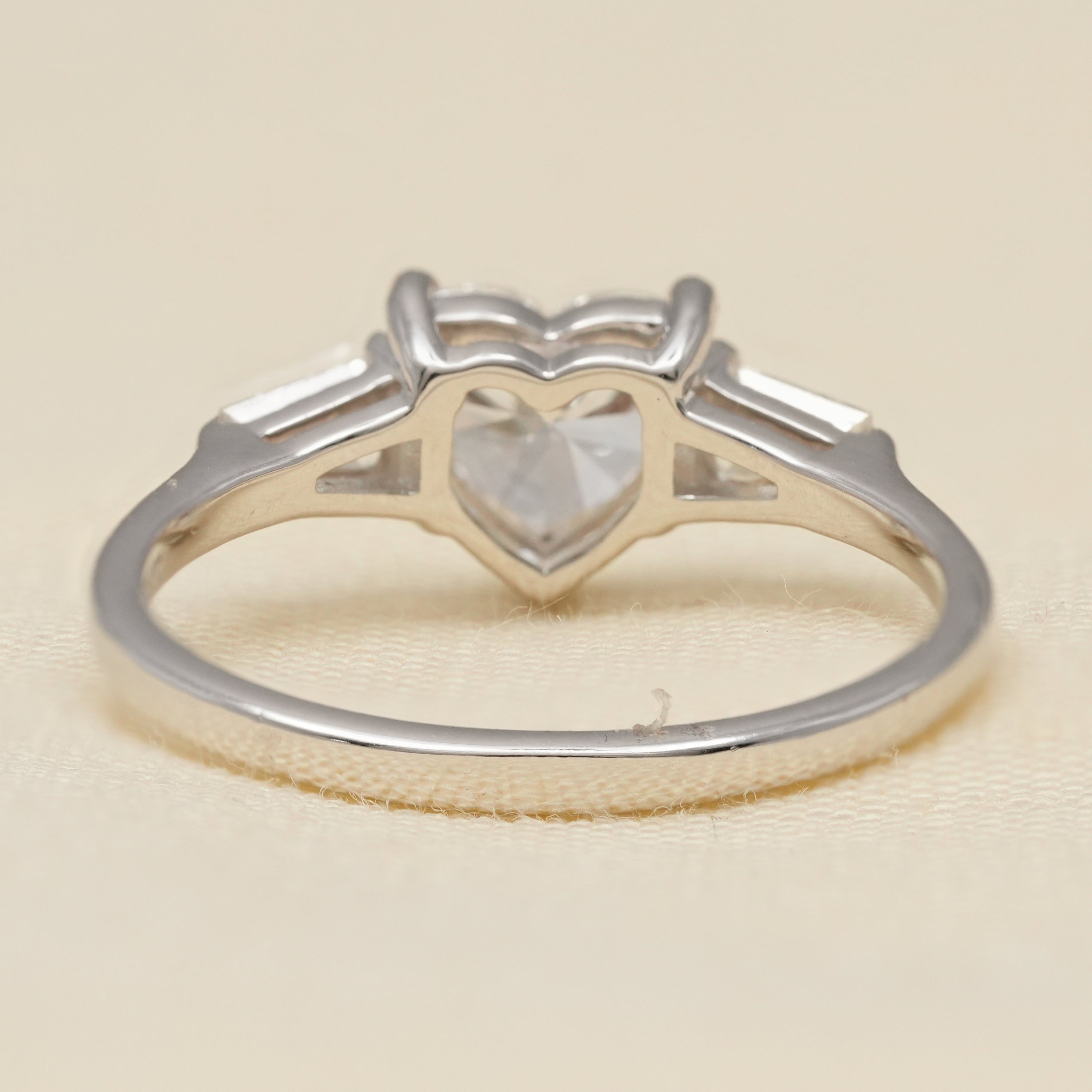 Luxury heart shaped ring crafted with lab grown diamond and baguette sides