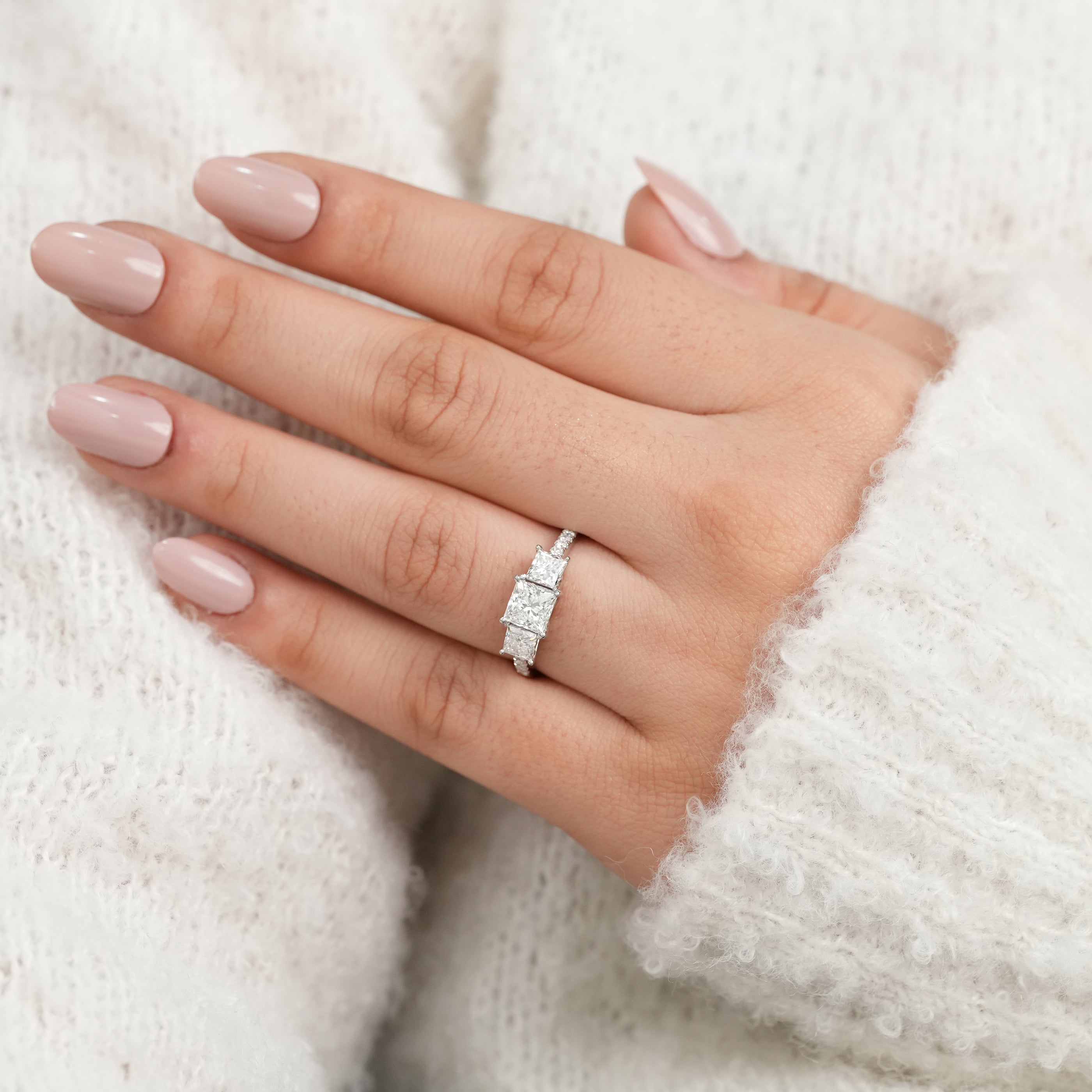 Princess cut three stone ring with lab grown diamonds for engagements