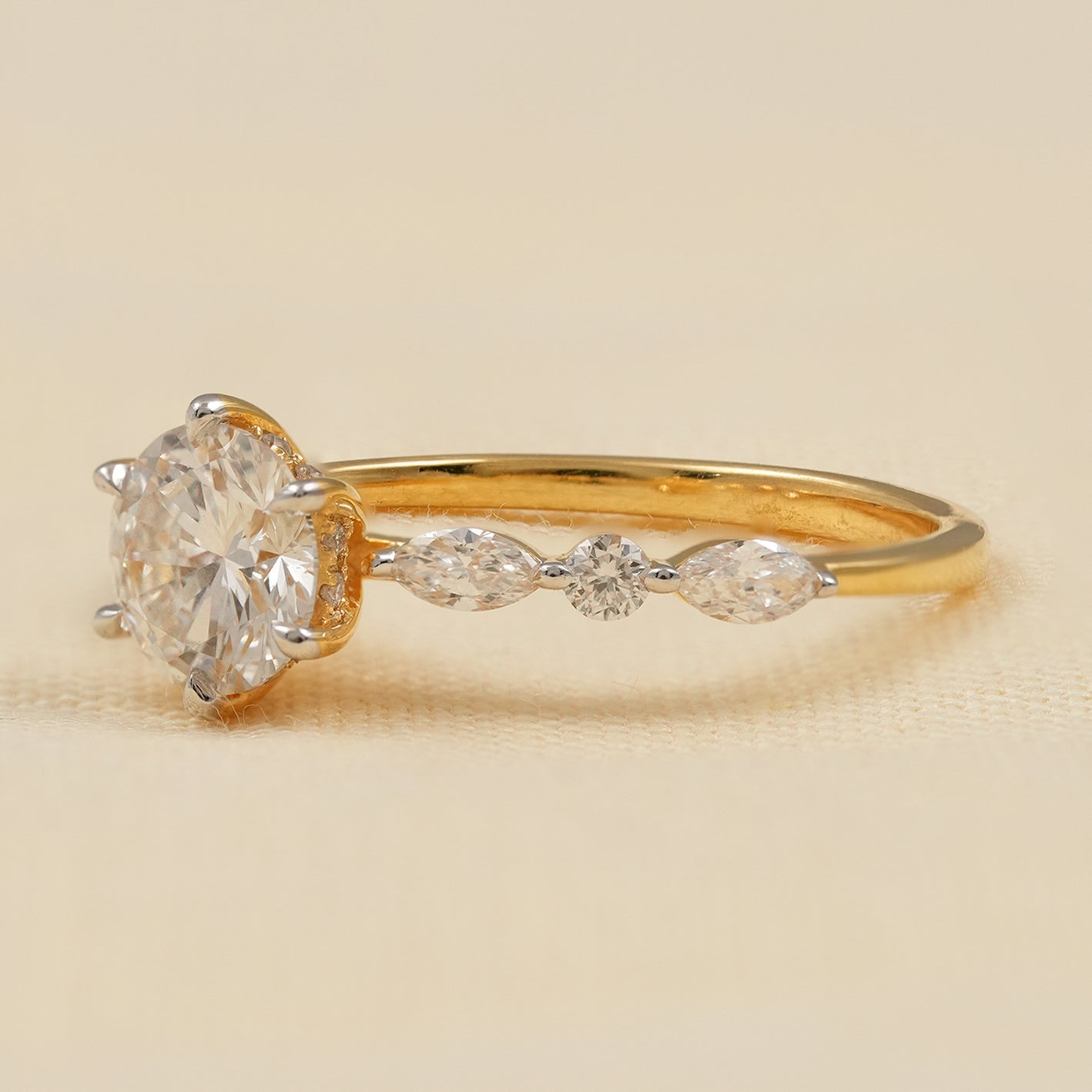 Yellow Gold Hidden Halo Ring with Round and Marquise Diamonds