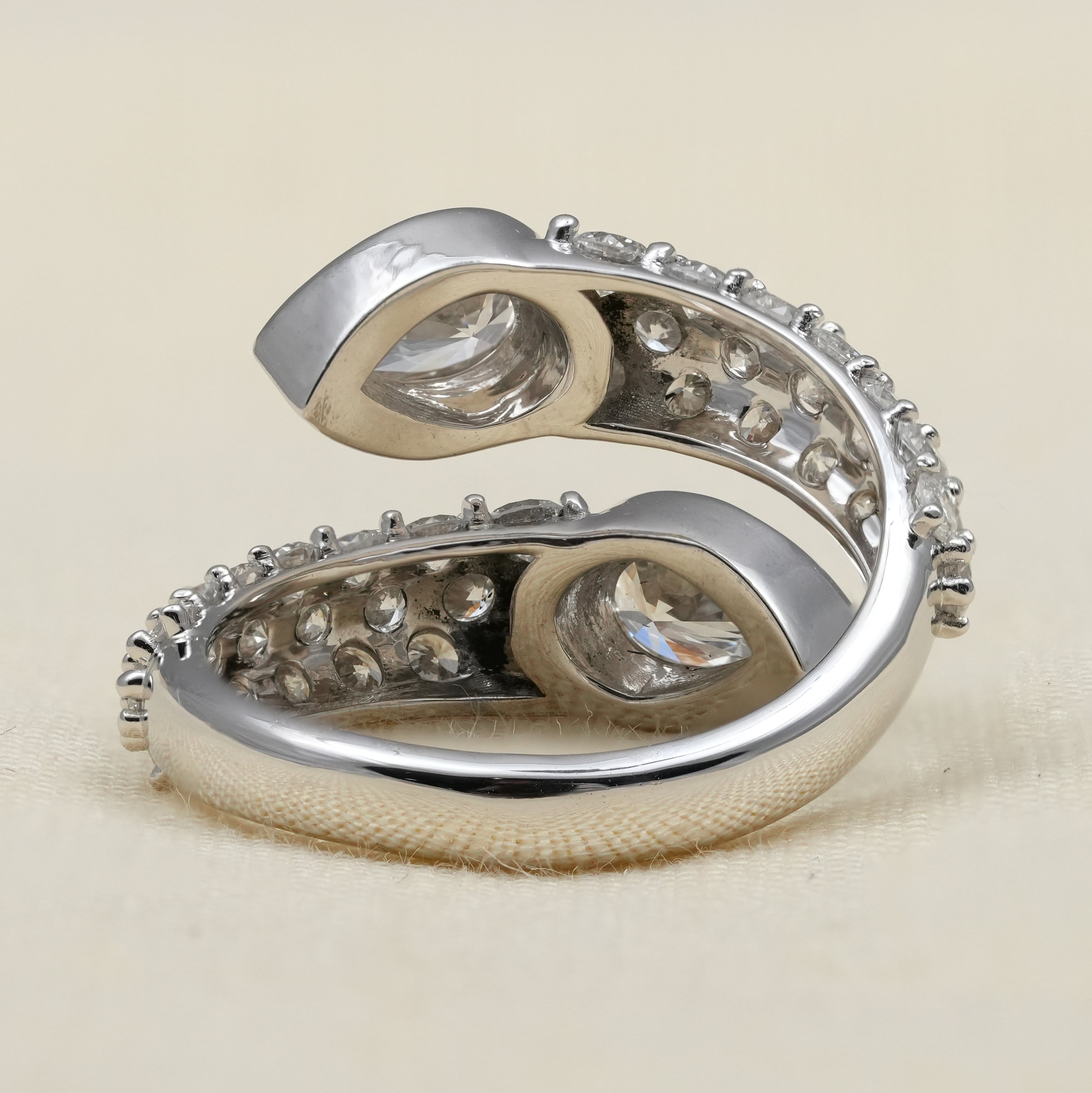 Luxury open ring crafted with pear lab grown diamonds and pavé stones