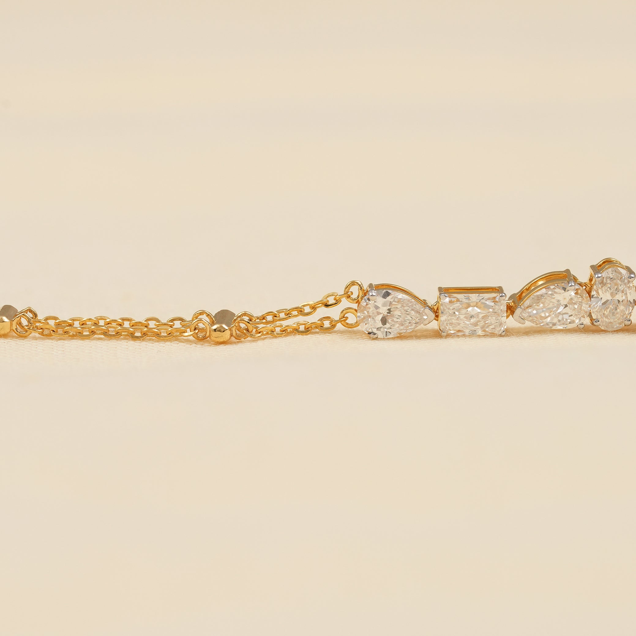 Elegant Yellow Gold Diamond Tennis Bracelet with Unique Cuts