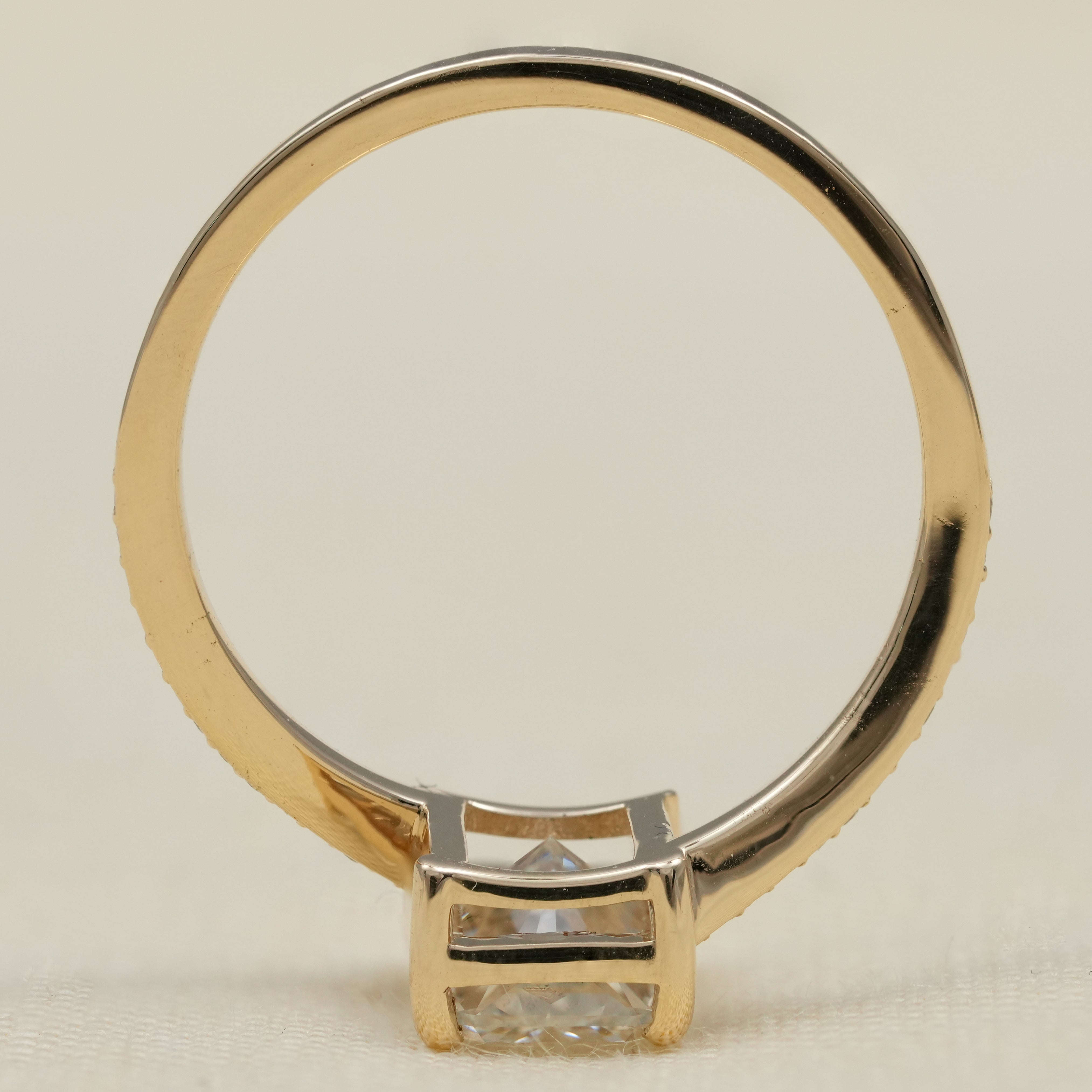 Elegant radiant cut ring with lab grown diamond and bypass band