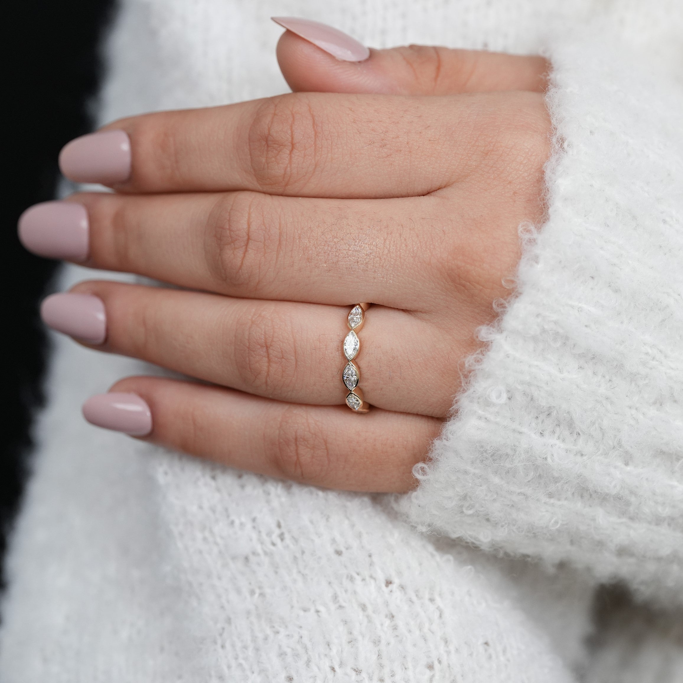 Classic bezel set marquise diamond ring featuring lab grown diamonds graceful design